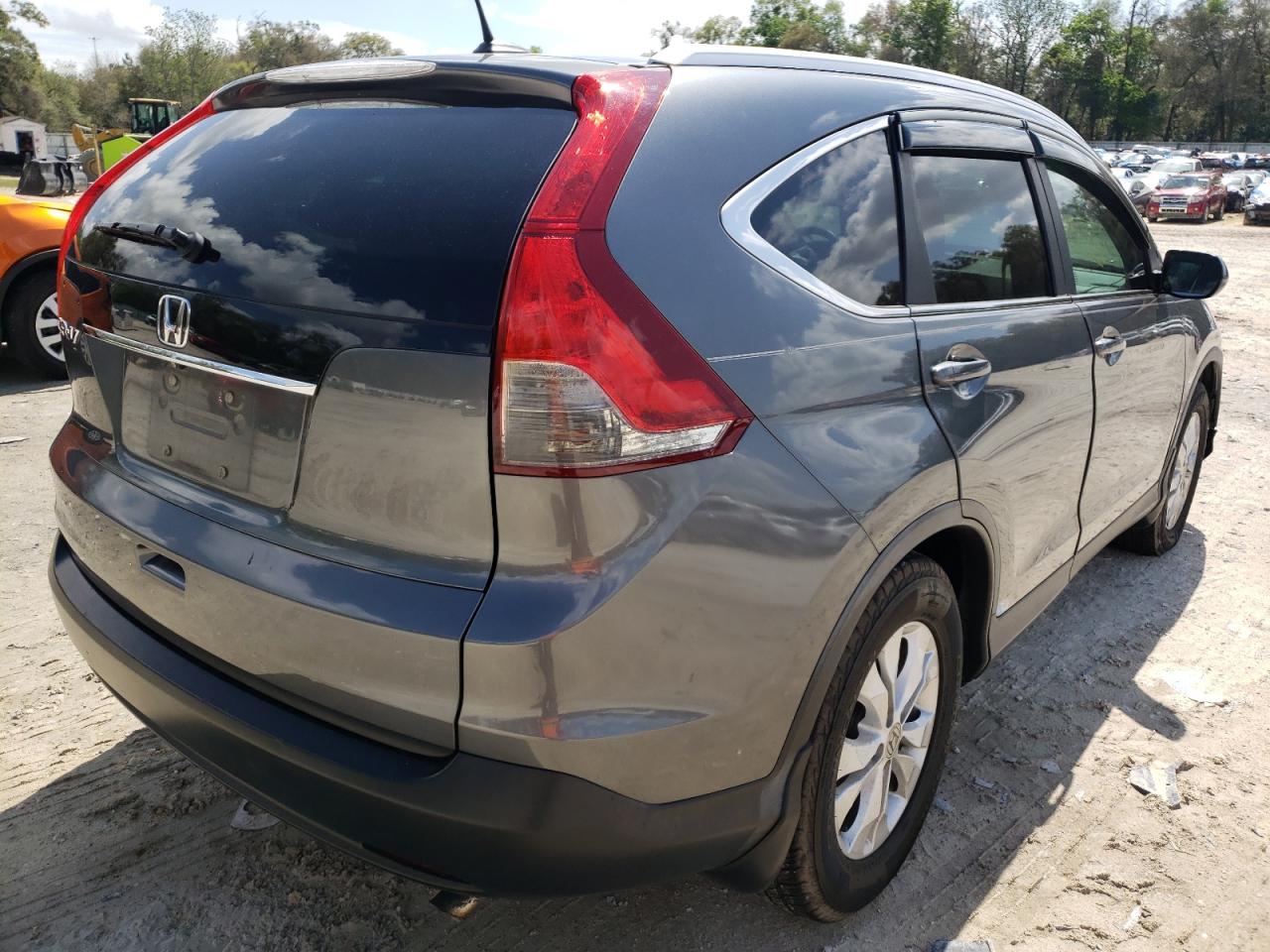 Photo 4 from auction – 2014 HONDA CR-V EXL with VIN 5J6RM3H73EL006924