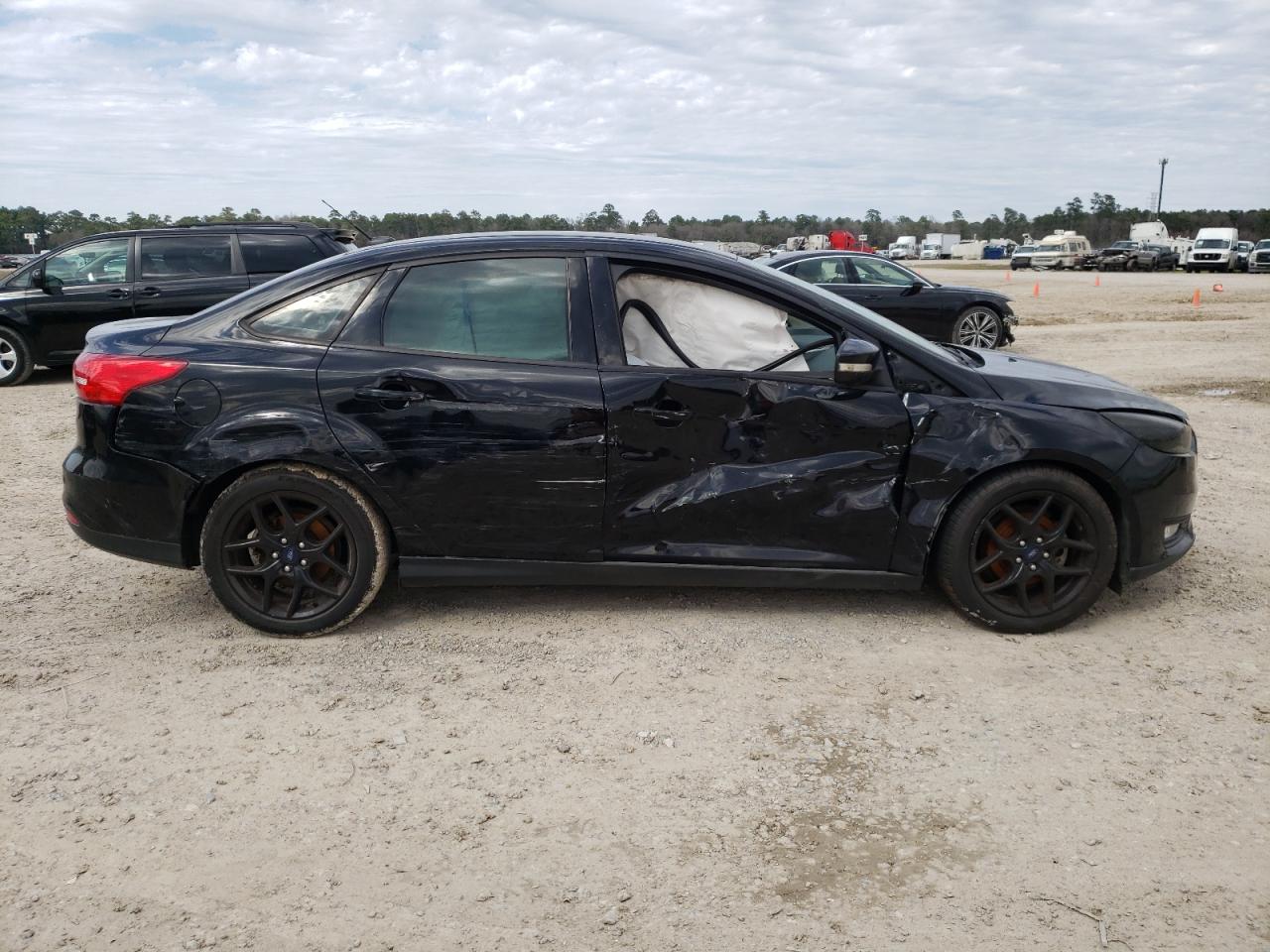 Photo 9 from auction – 2016 FORD FOCUS SE with VIN 1FADP3F22GL394896