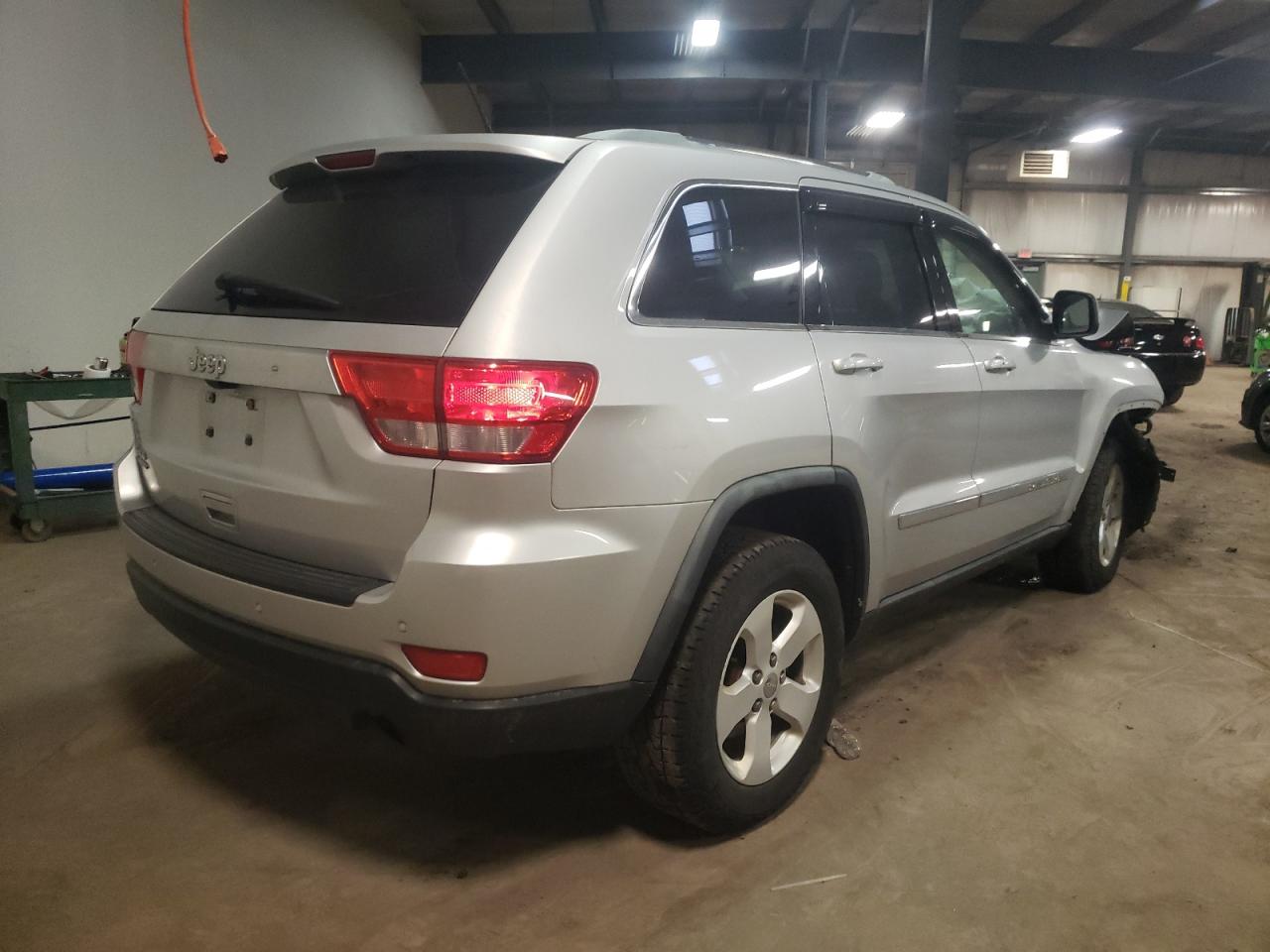 Photo 4 from auction – 2011 JEEP GRAND CHER with VIN 1J4RR4GG6BC572824