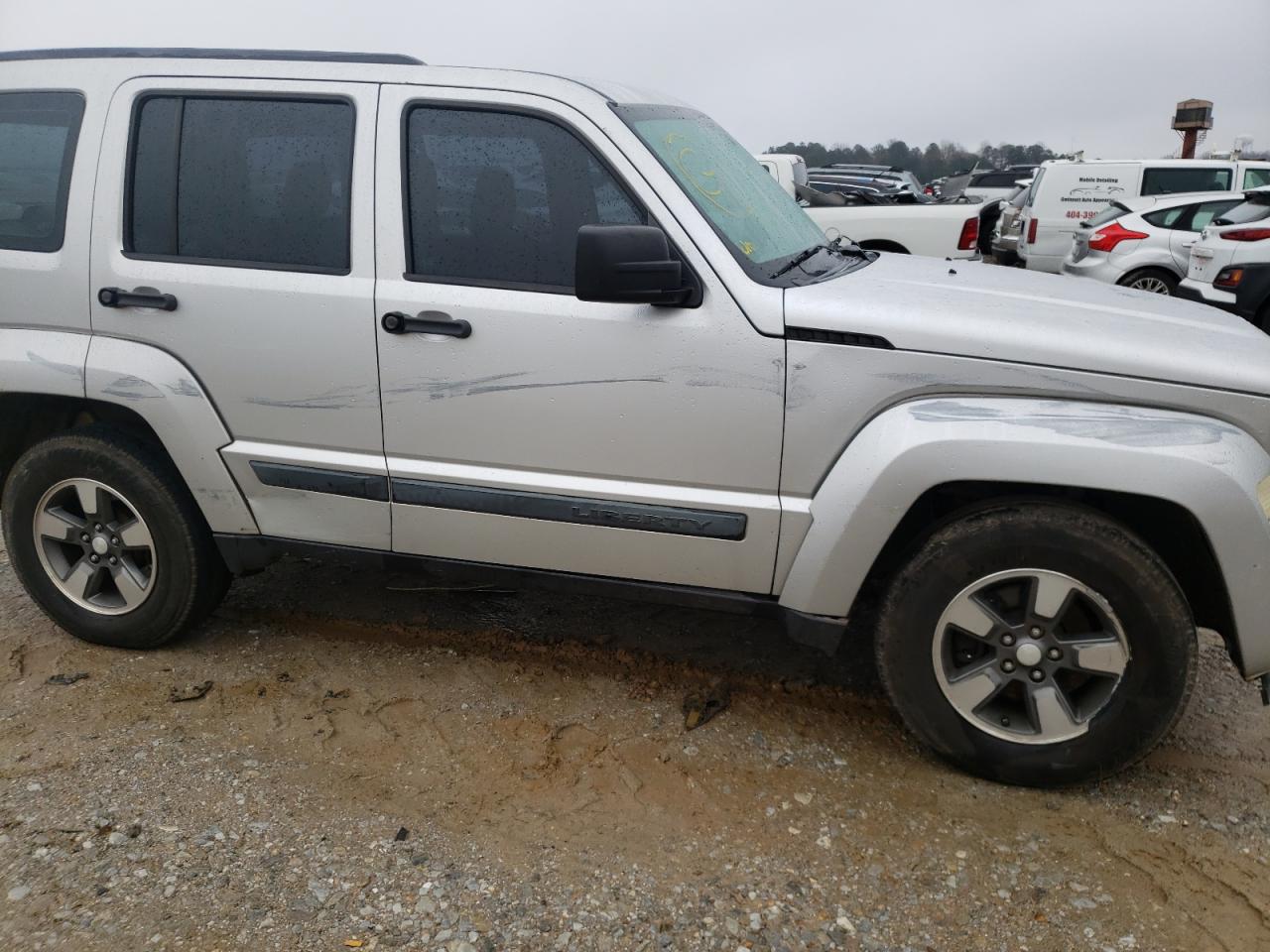 Photo 9 from auction – 2009 JEEP LIBERTY SP with VIN 1J8GP28K99W503489