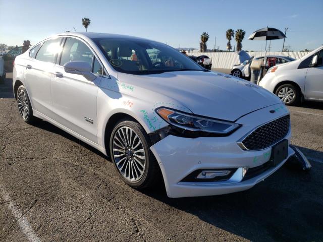 FORD FUSION TIT 2017 with VIN 3FA6P0SU6HR409885 - Photo from auction