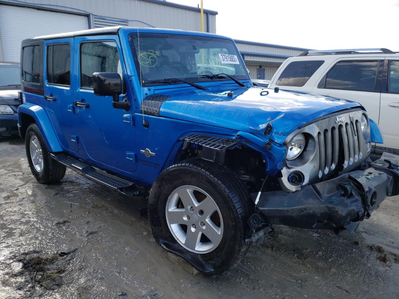 Foto 1 de la subasta – 2015 JEEP WRANGLER U con VIN 1C4BJWDG7FL613014