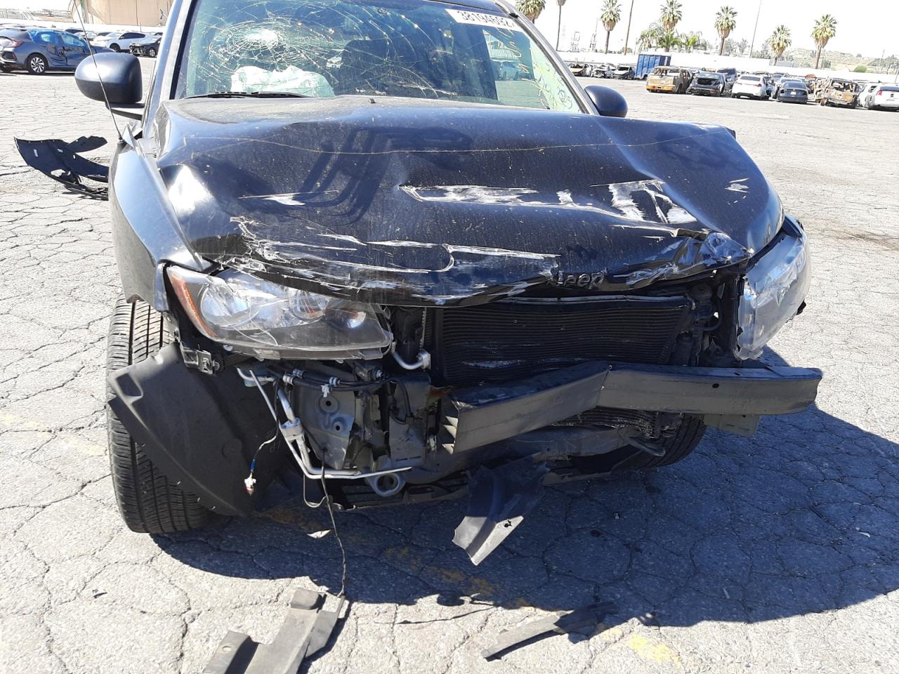 Photo 9 from auction – 2015 JEEP COMPASS SP with VIN 1C4NJCBA1FD427800