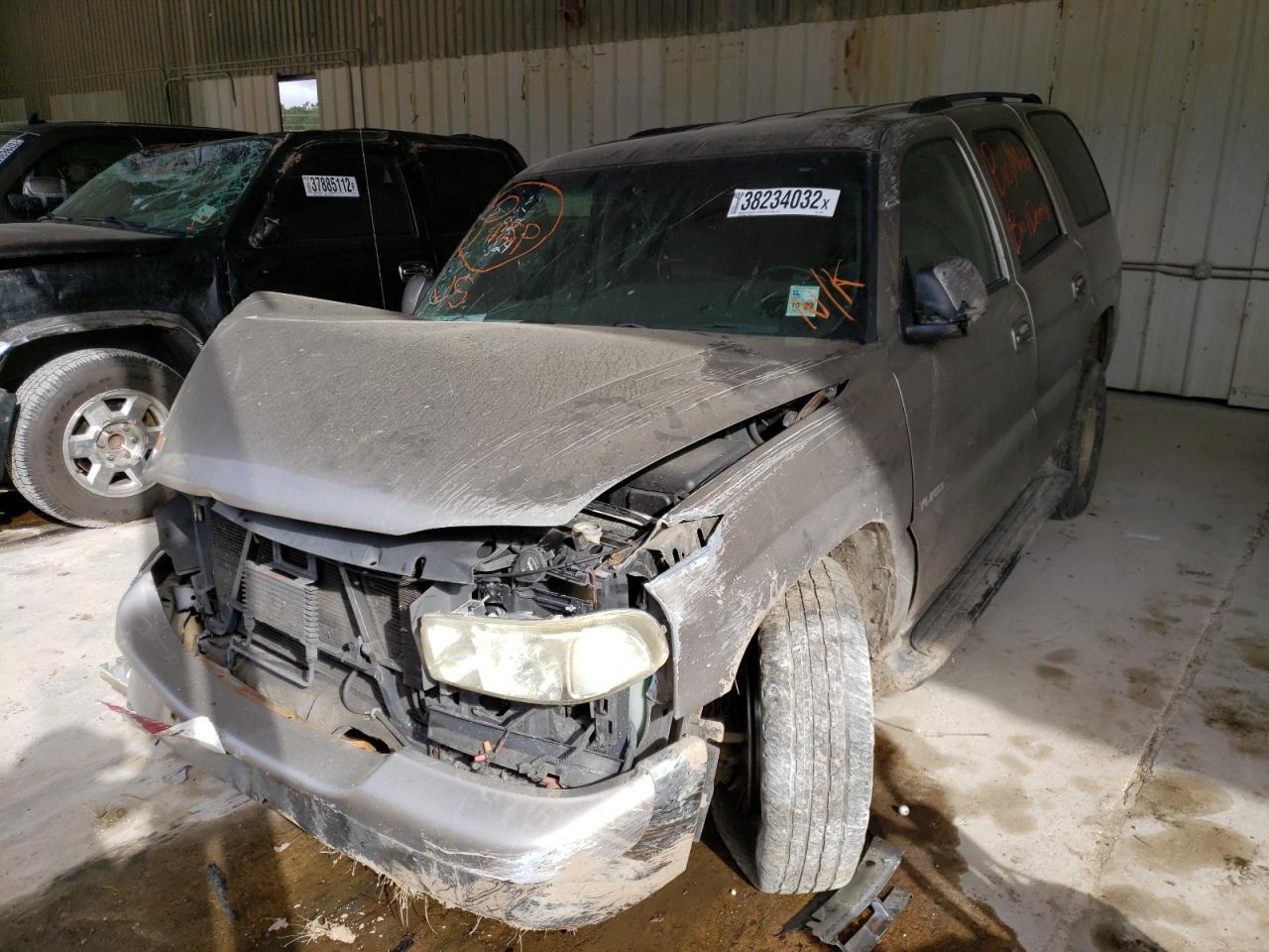 Photo 2 from auction – 2003 GMC YUKON with VIN 1GKEC13Z03R162292
