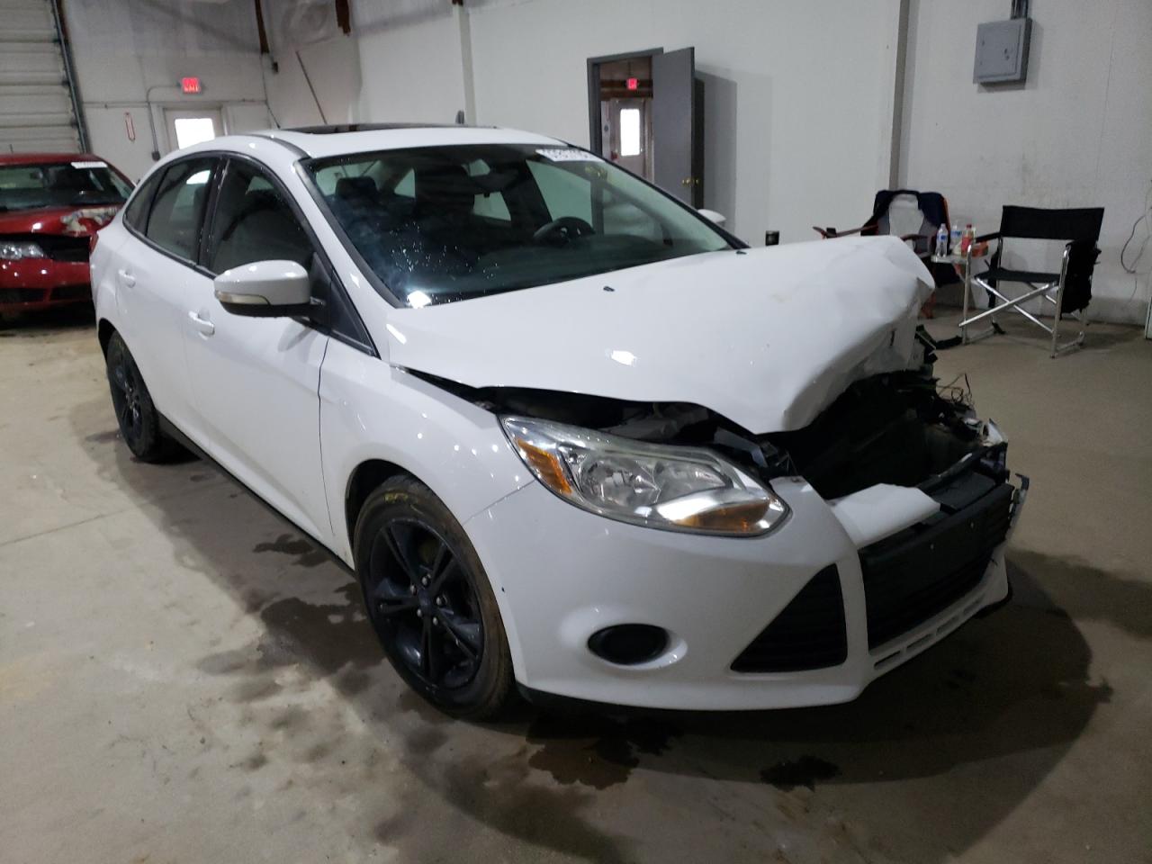 FORD FOCUS SE 2013 with VIN 1FADP3F2XDL300565 - Photo from auction