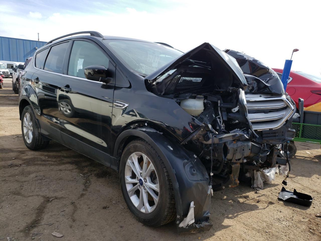 FORD ESCAPE SE 2018 مع رقم تعريف المركبة 1FMCU9GD8JUC85583 - صورة من المزاد