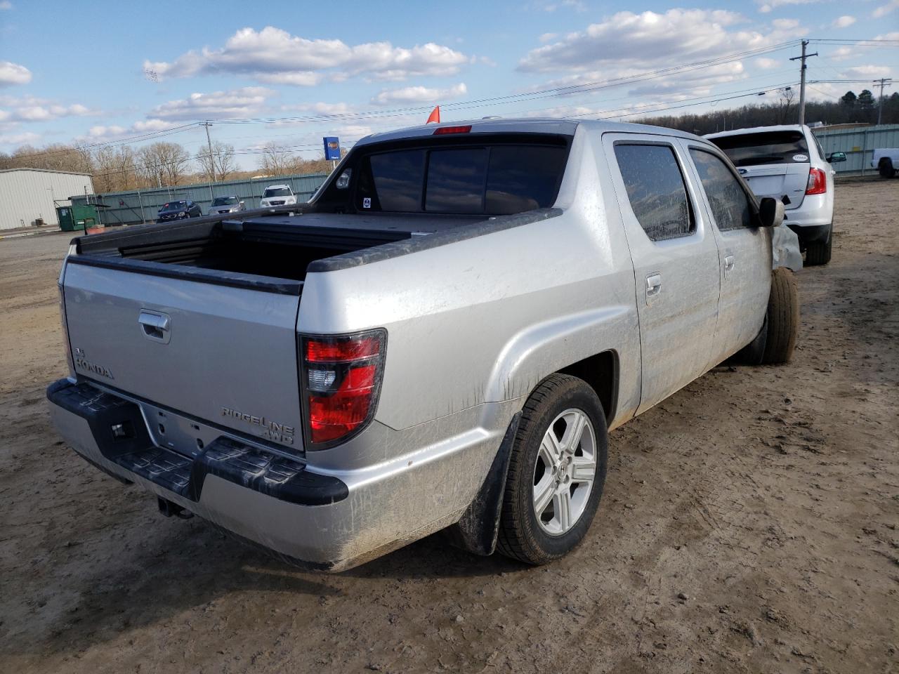 Photo 4 from auction – 2013 HONDA RIDGELINE with VIN 5FPYK1F54DB010373