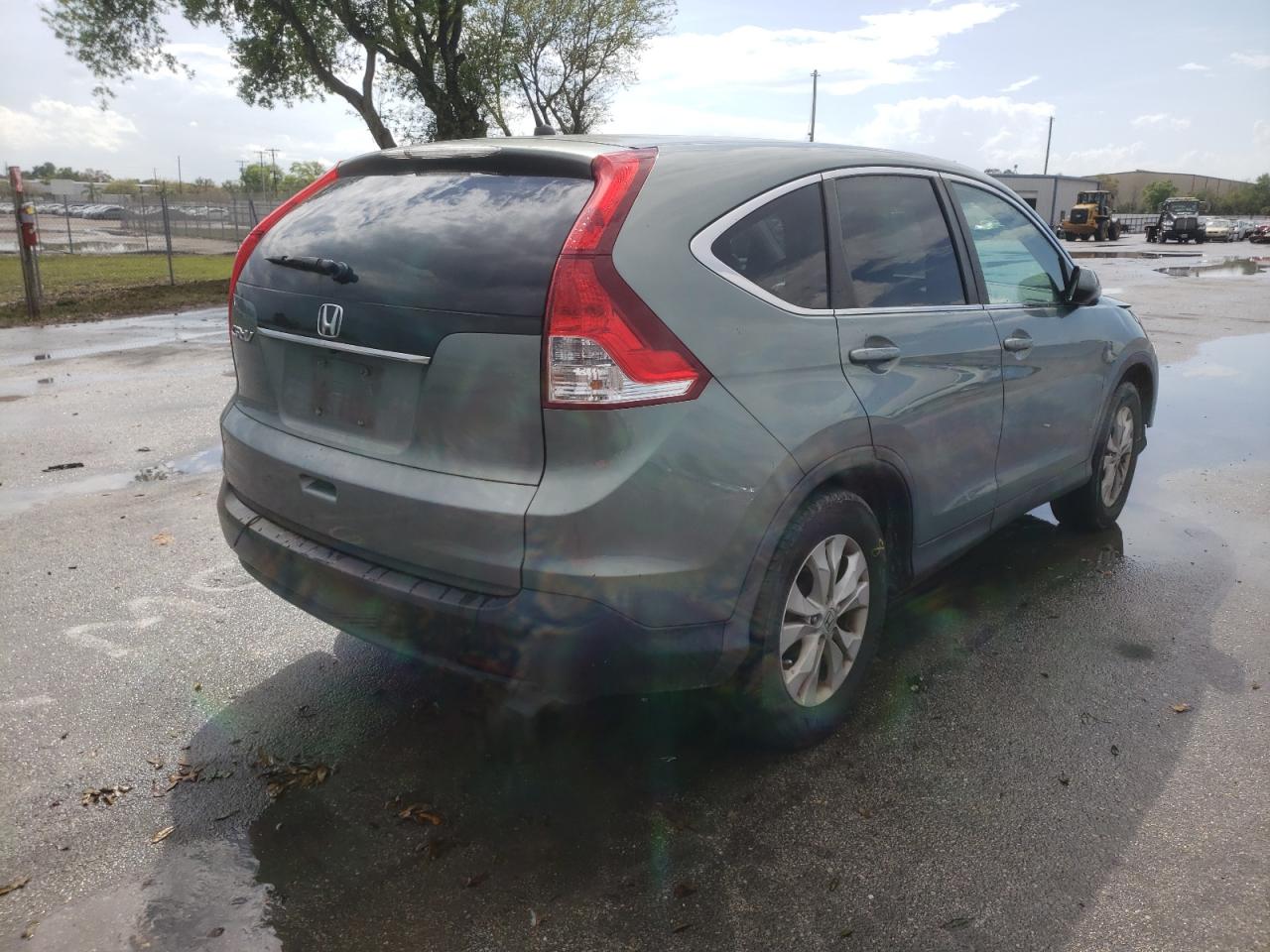 Photo 4 from auction – 2012 HONDA CR-V EX with VIN 5J6RM3H56CL040089