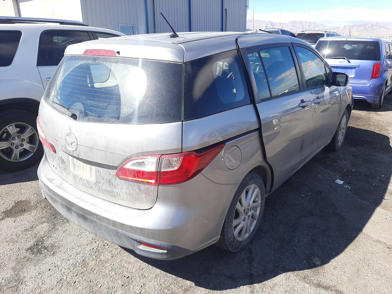 Photo 4 from auction – 2014 MAZDA 5 SPORT with VIN JM1CW2BL9E0177572