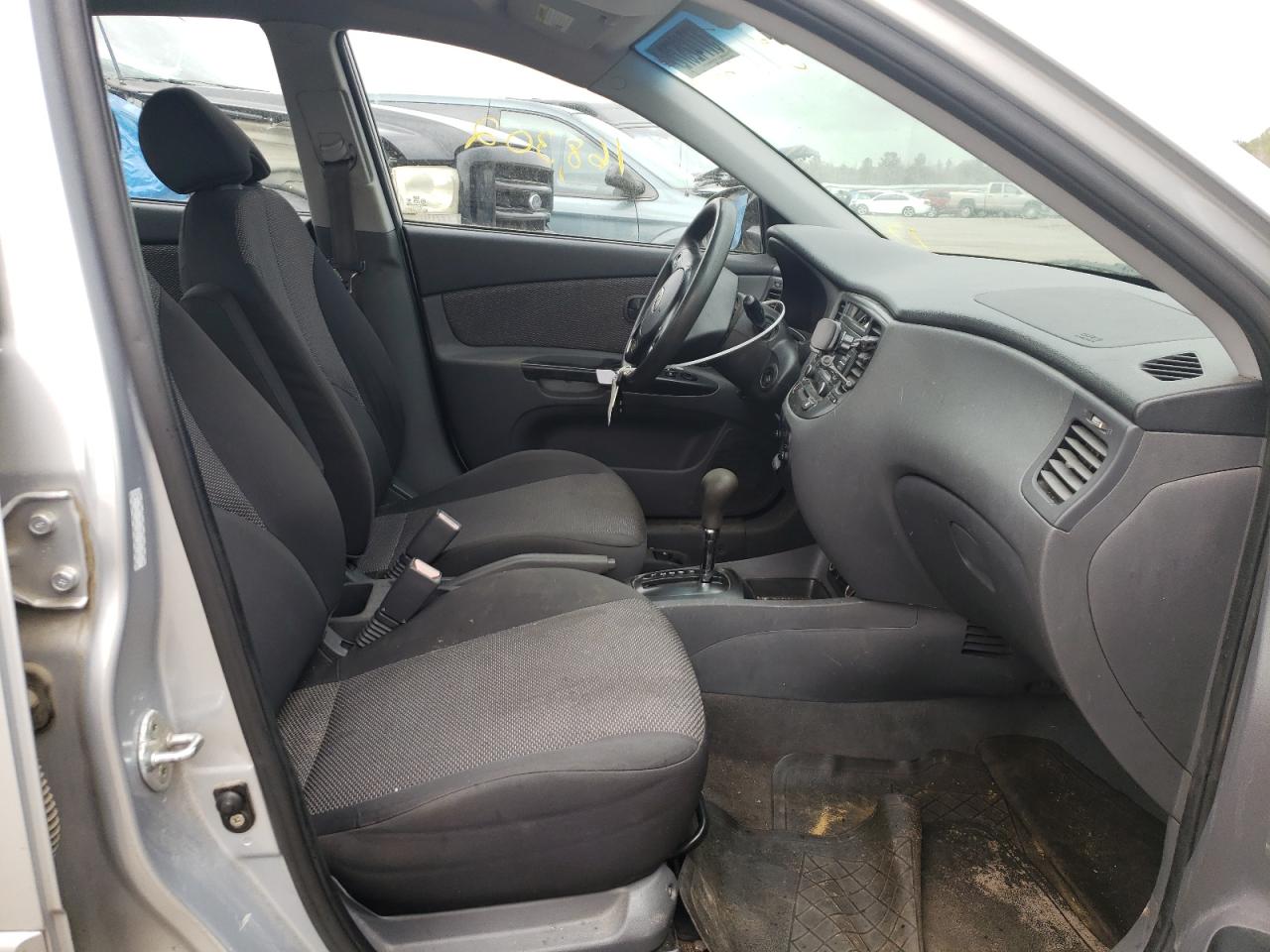 Photo 5 from auction – 2011 KIA RIO BASE with VIN KNADH4A35B6914588