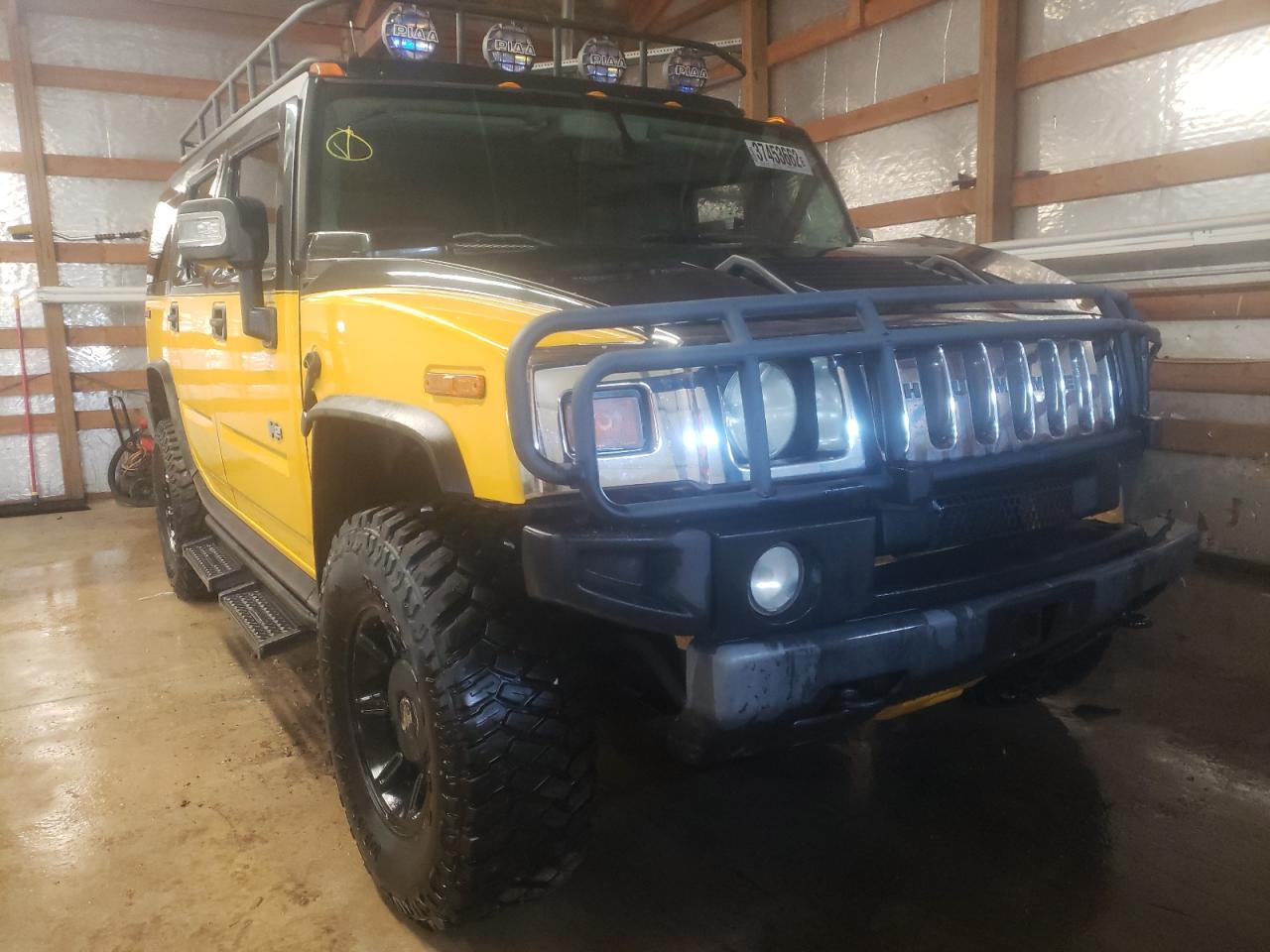 HUMMER H2 2003 with VIN 5GRGN23U13H126009 - Photo from auction