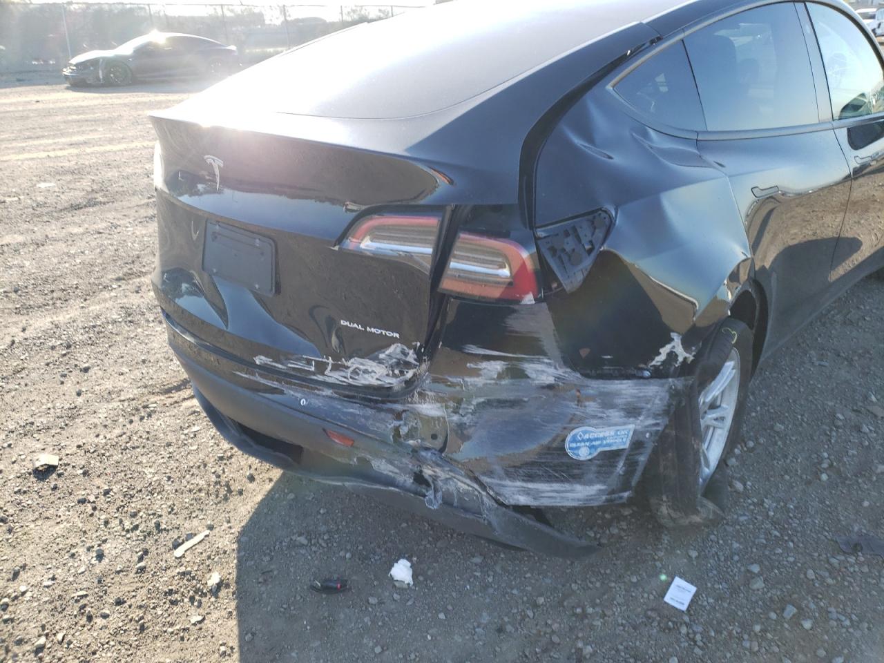 Photo 9 from auction – 2021 TESLA MODEL Y with VIN 5YJYGDEE2MF276309