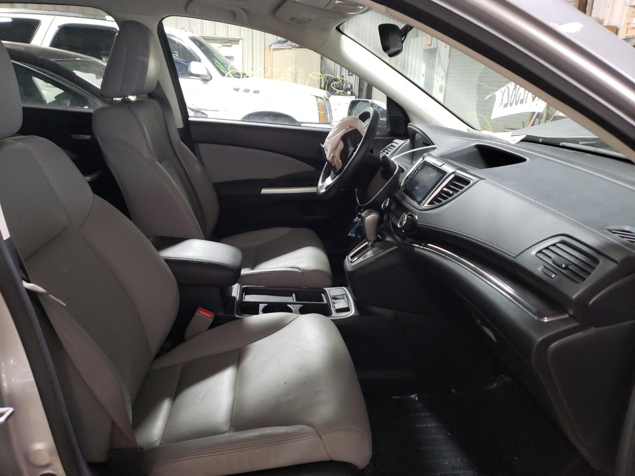 Photo 5 from auction – 2016 HONDA CR-V EXL with VIN 5J6RM4H72GL028521