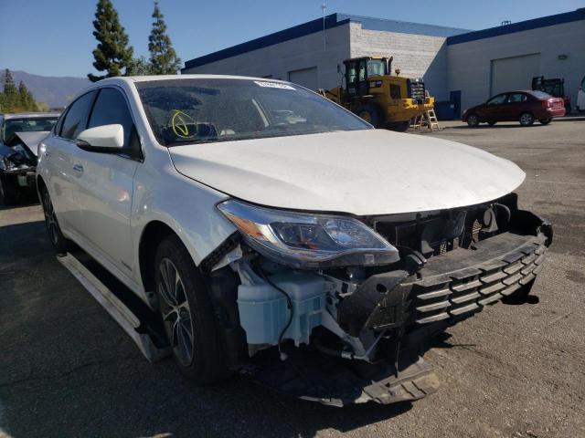 TOYOTA AVALON HYB 2016 with VIN 4T1BD1EB5GU056950 - Photo from auction