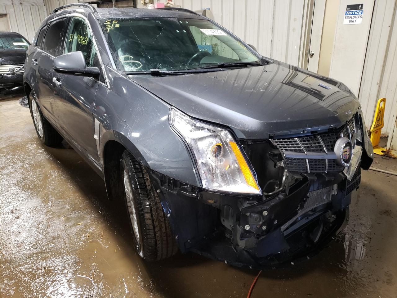 CADILLAC SRX 2011 with VIN 3GYFNGEY2BS609860 - Photo from auction