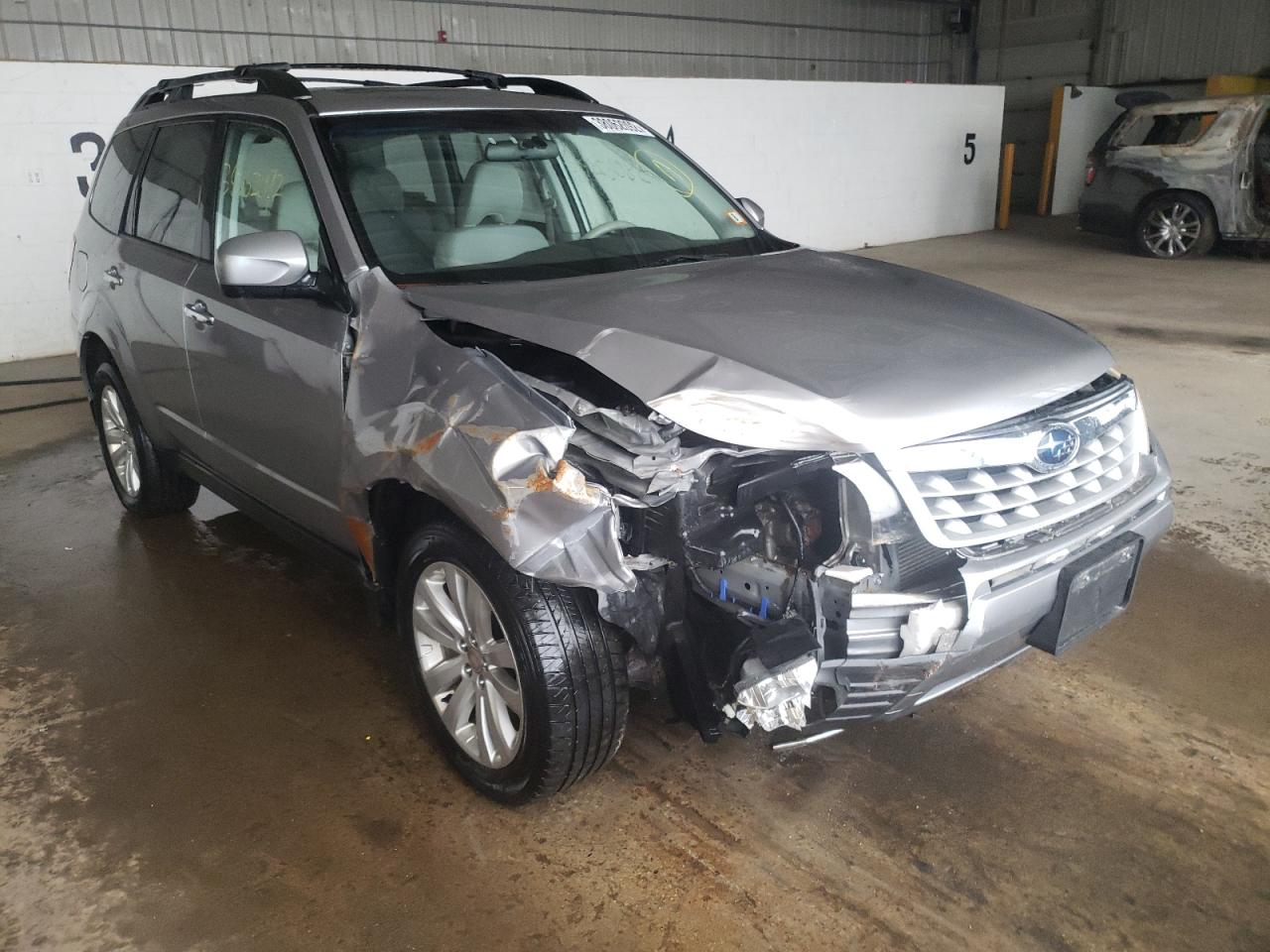 SUBARU FORESTER 2 2011 with VIN JF2SHADC1BH749598 - Photo from auction
