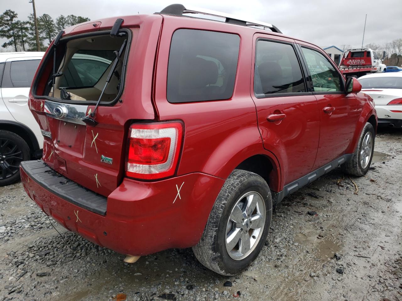 Photo 4 from auction – 2011 FORD ESCAPE LIM with VIN 1FMCU9EG5BKA25359