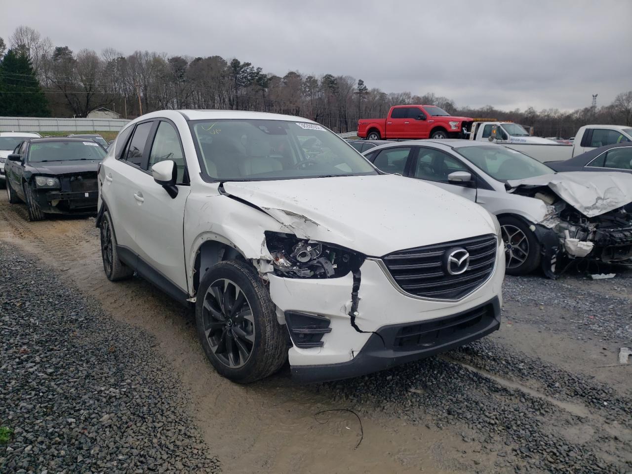 MAZDA CX-5 2016 z numerem VIN JM3KE2DYXG0658836 - Zdjęcie z aukcji