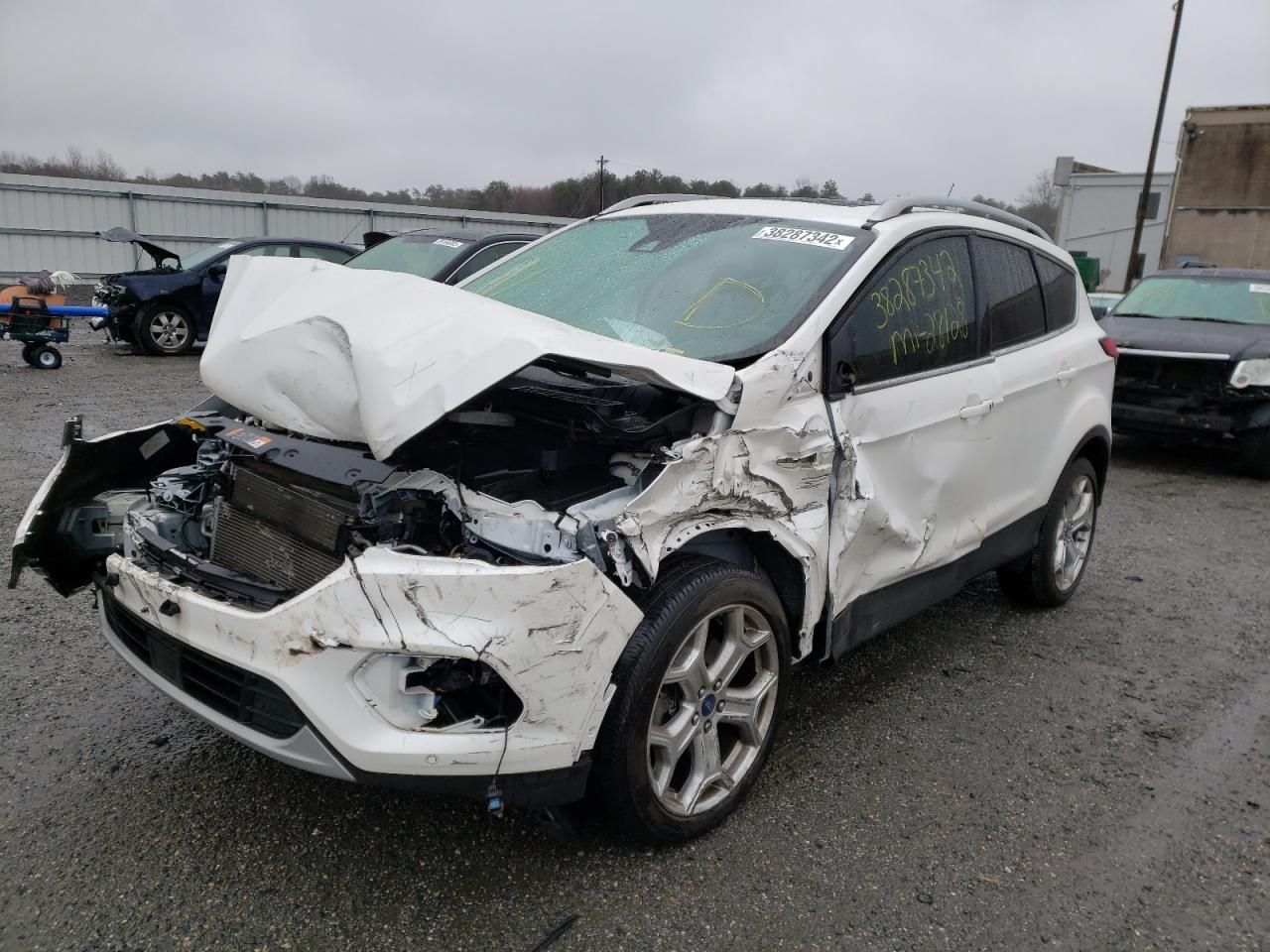 Photo 2 from auction – 2019 FORD ESCAPE TIT with VIN 1FMCU9J91KUB96184