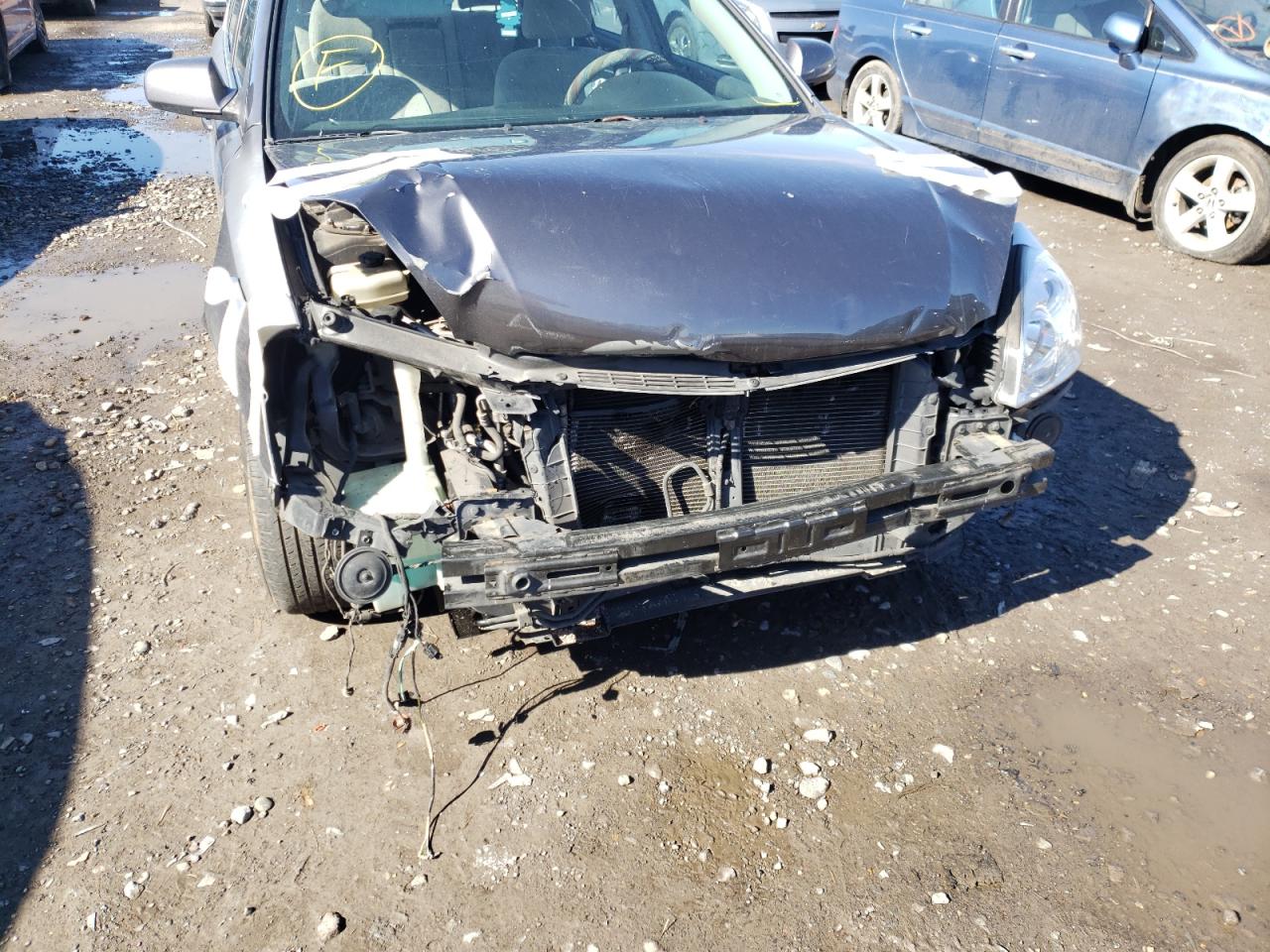 Photo 9 from auction – 2006 KIA OPTIMA LX with VIN KNAGE123765056460