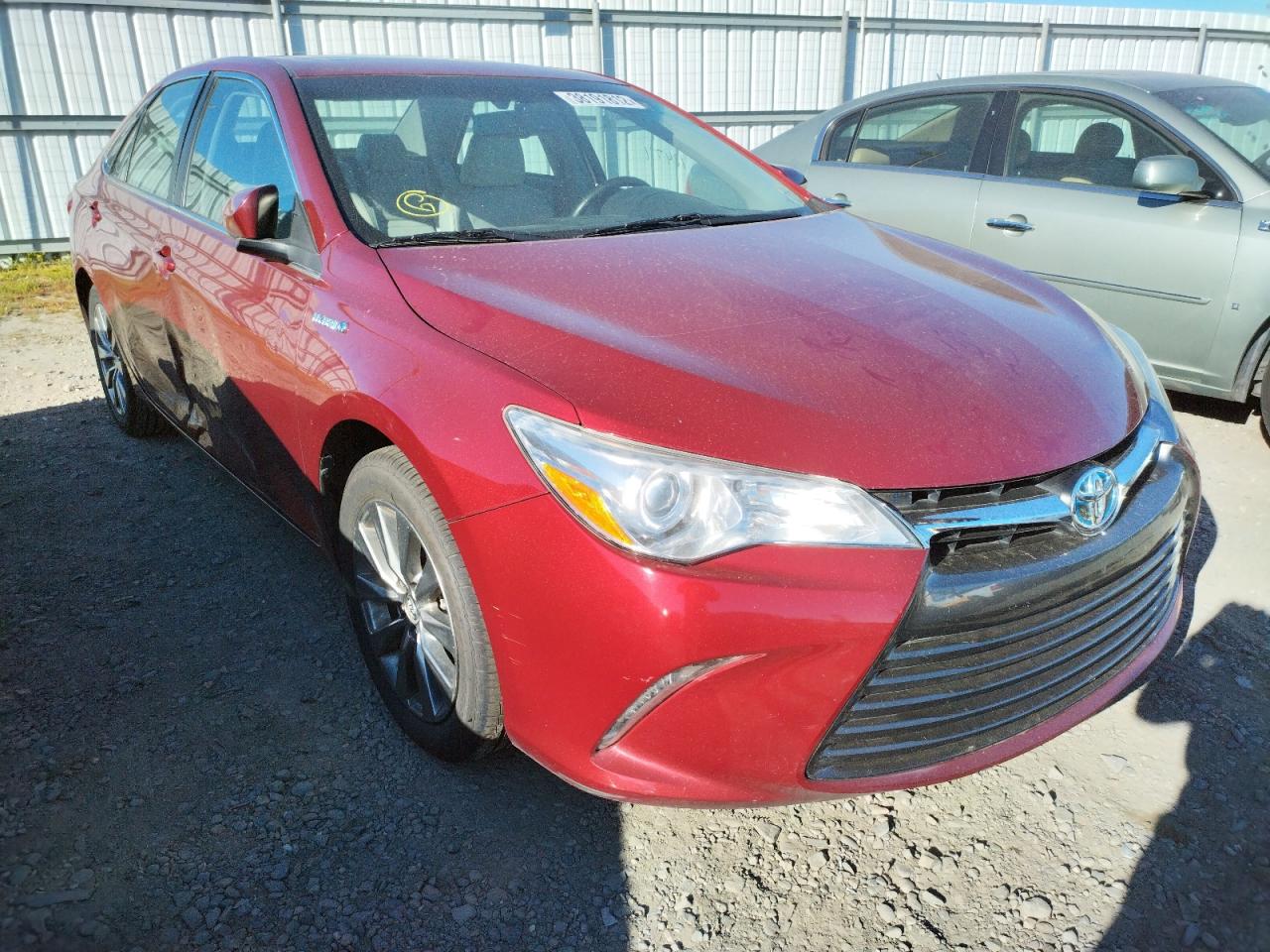 Photo 1 from auction – 2016 TOYOTA CAMRY HYBR with VIN 4T1BD1FK3GU181802