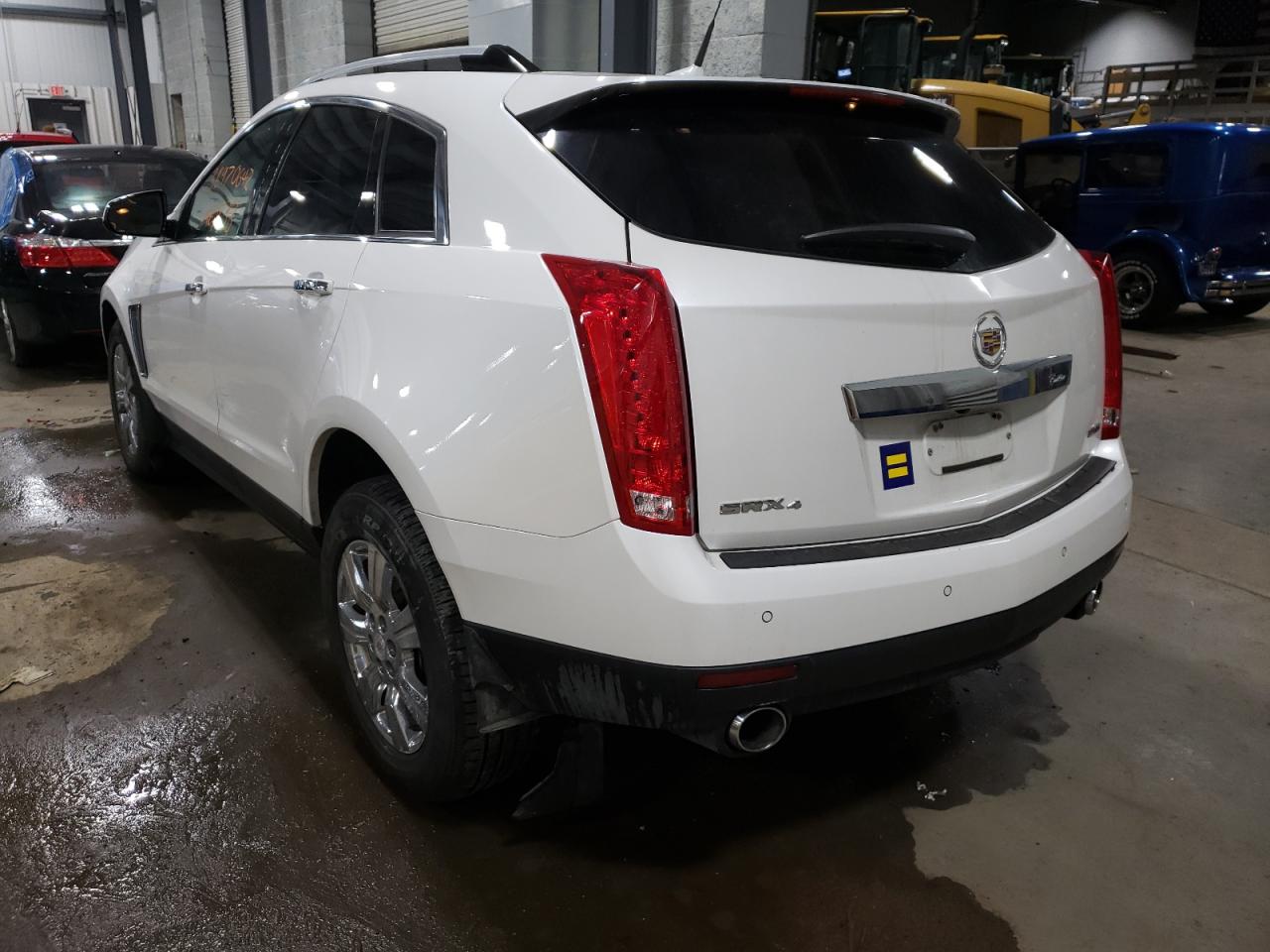 Photo 3 from auction – 2014 CADILLAC SRX LUXURY with VIN 3GYFNEE39ES665615