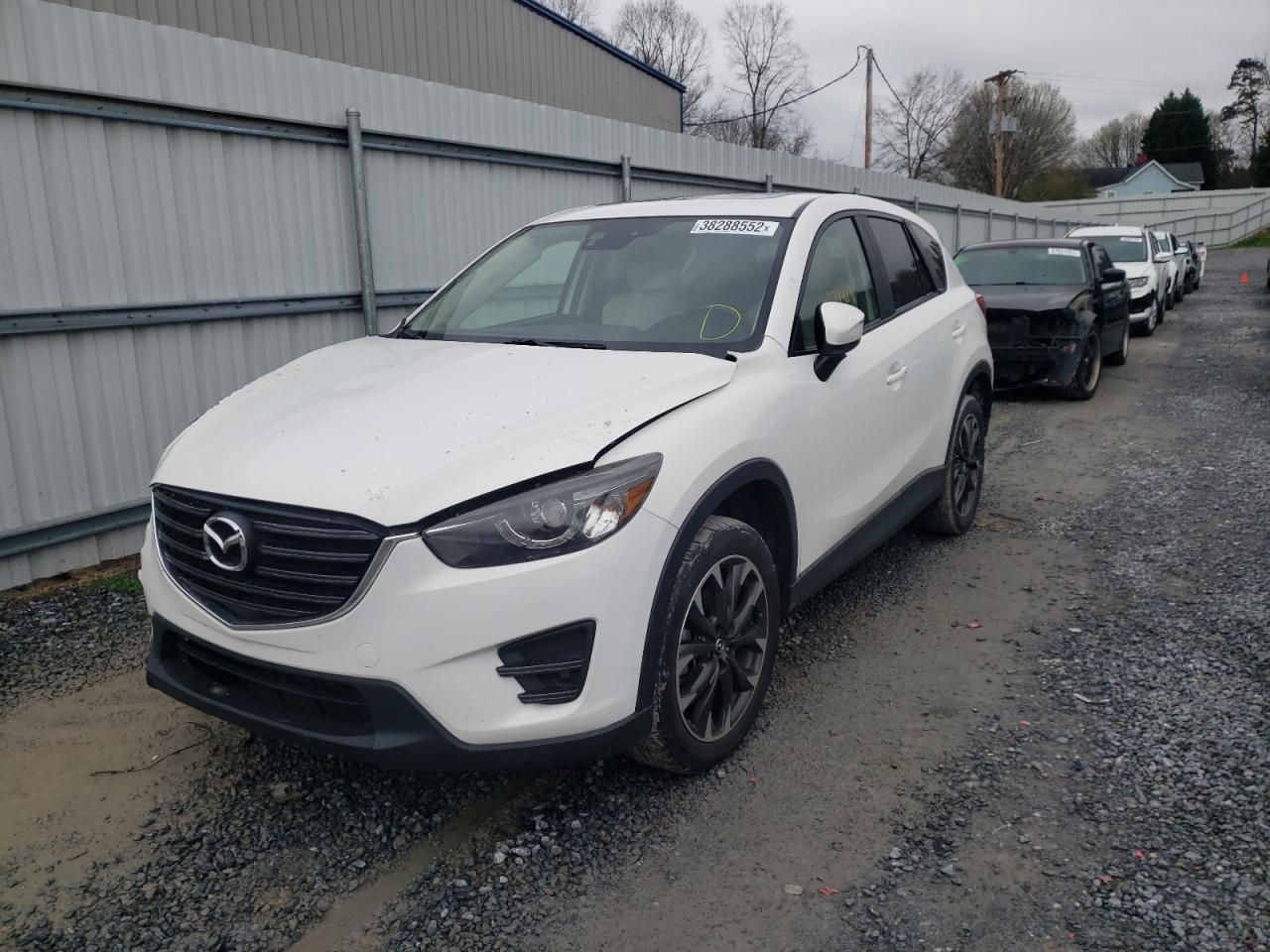 Photo 2 from auction – 2016 MAZDA CX-5 with VIN JM3KE2DYXG0658836