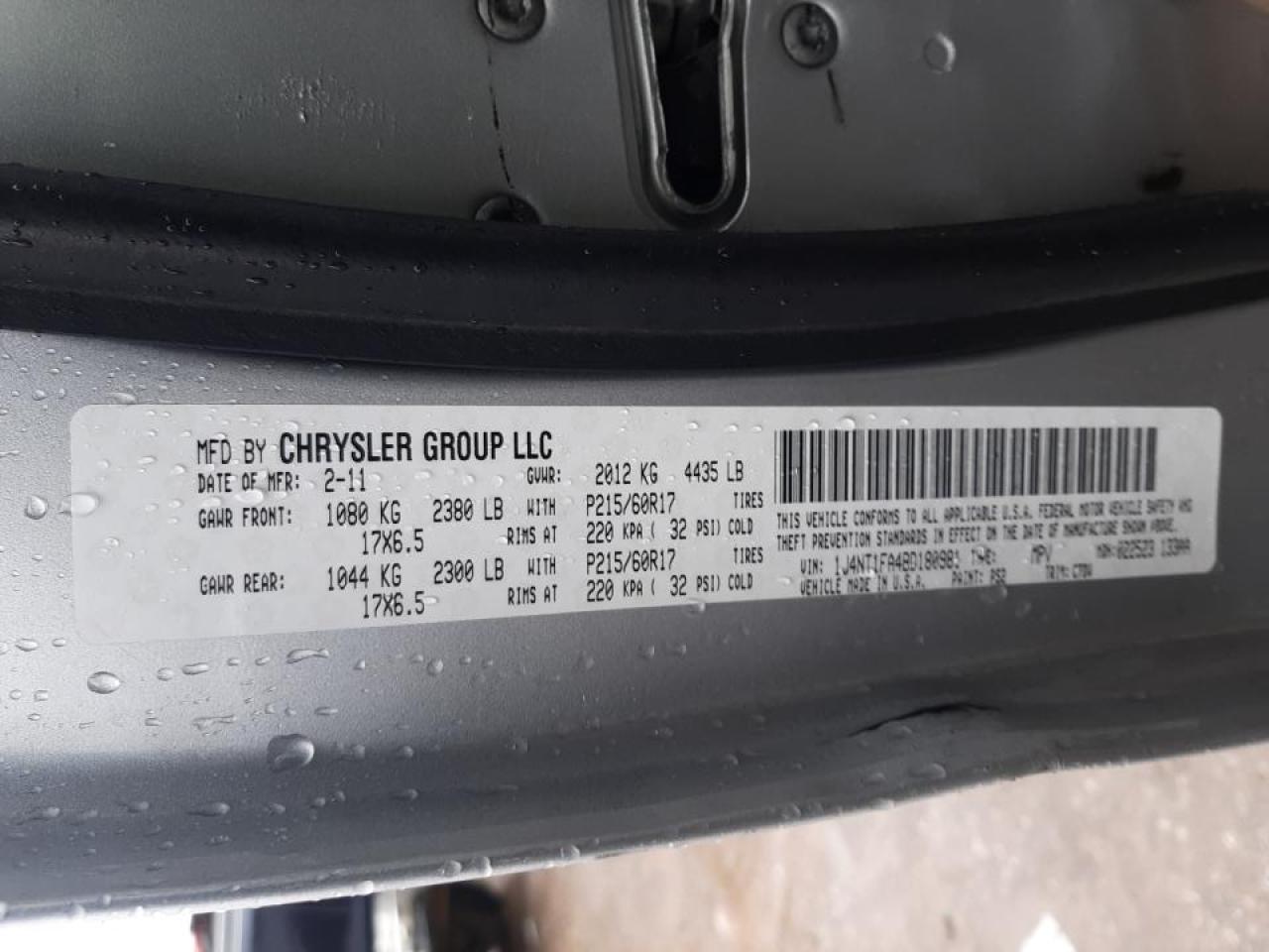 Photo 10 from auction – 2011 JEEP COMPASS SP with VIN 1J4NT1FA4BD180981