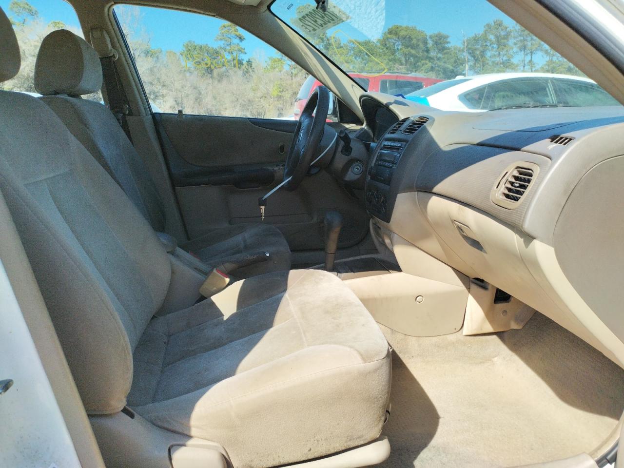 Photo 5 from auction – 2002 MAZDA PROTEGE DX with VIN JM1BJ225920534059
