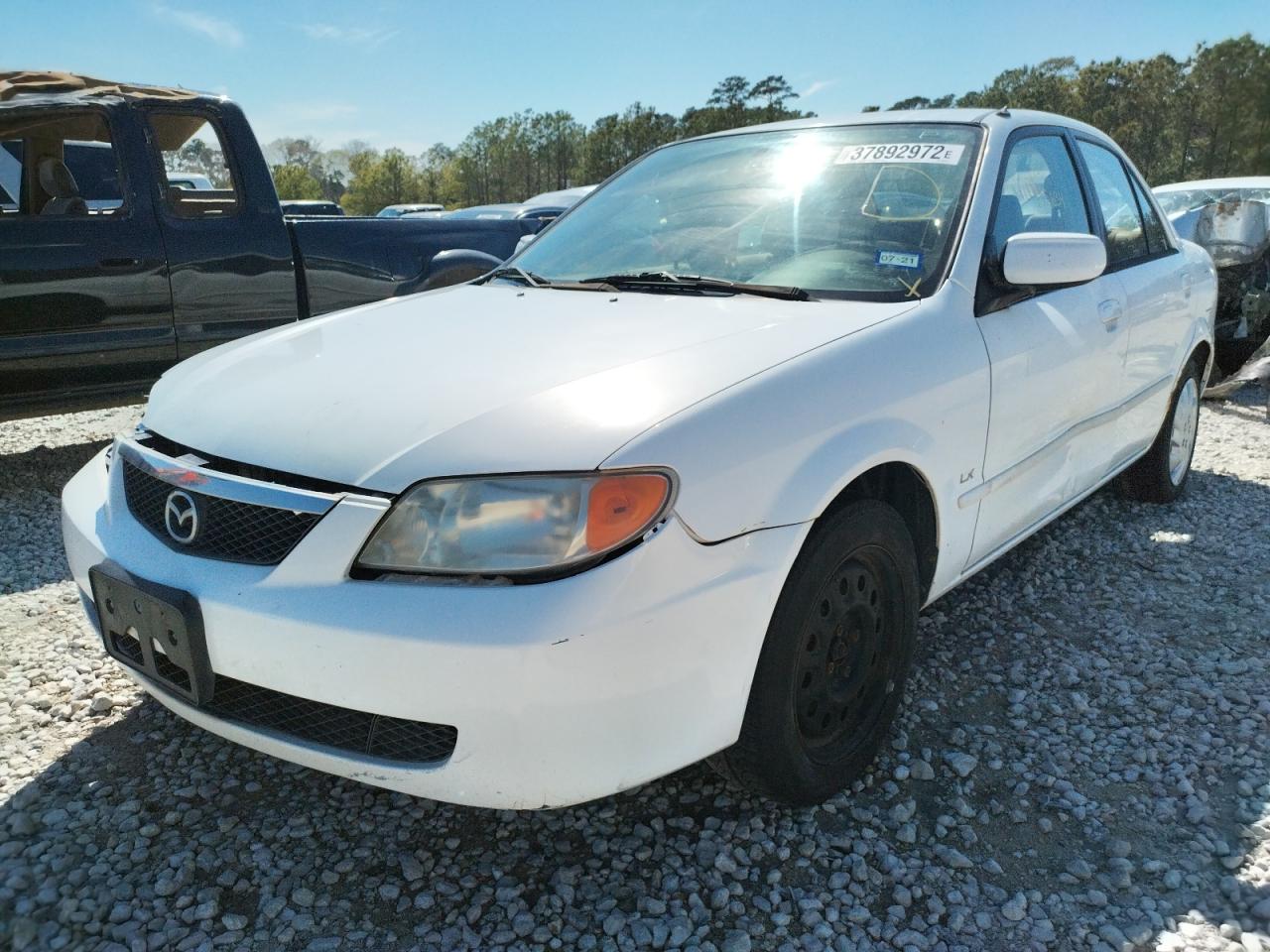 Photo 2 from auction – 2002 MAZDA PROTEGE DX with VIN JM1BJ225920534059