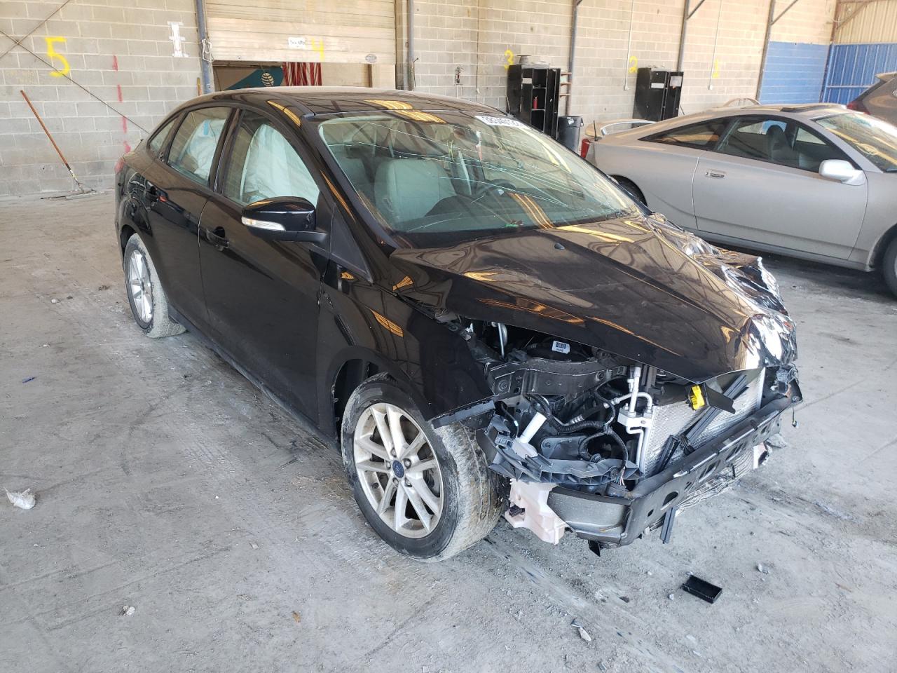 FORD FOCUS SE 2016 with VIN 1FADP3F29GL304224 - Photo from auction
