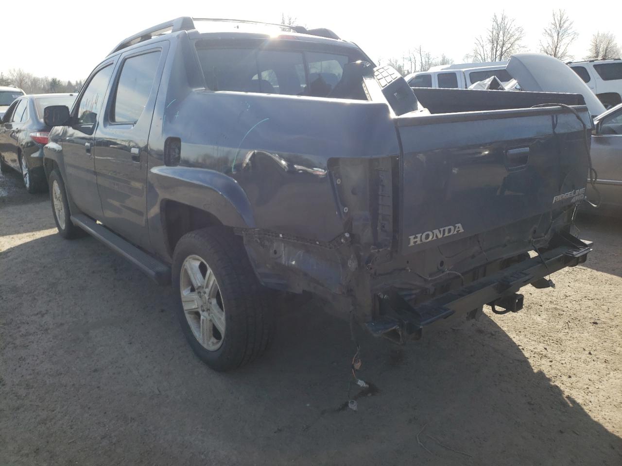 Photo 3 from auction – 2010 HONDA RIDGELINE with VIN 5FPYK1F57AB011416