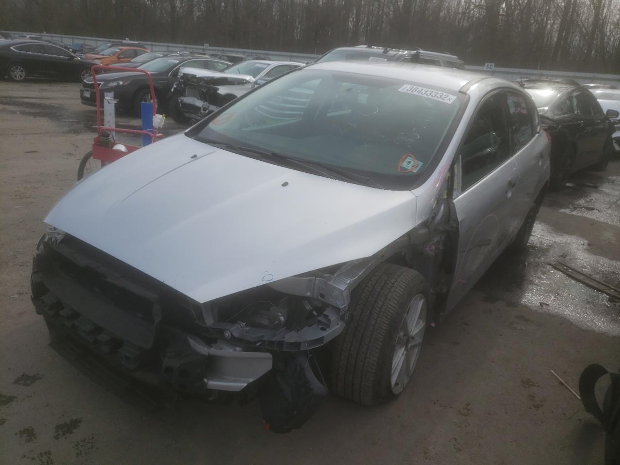 Photo 2 from auction – 2017 FORD FOCUS SE with VIN 1FADP3K22HL215702