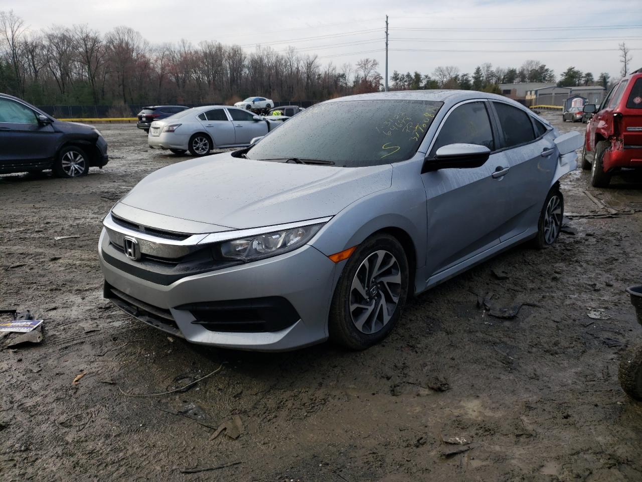 Photo 2 from auction – 2018 HONDA CIVIC EX with VIN 19XFC2F72JE039490