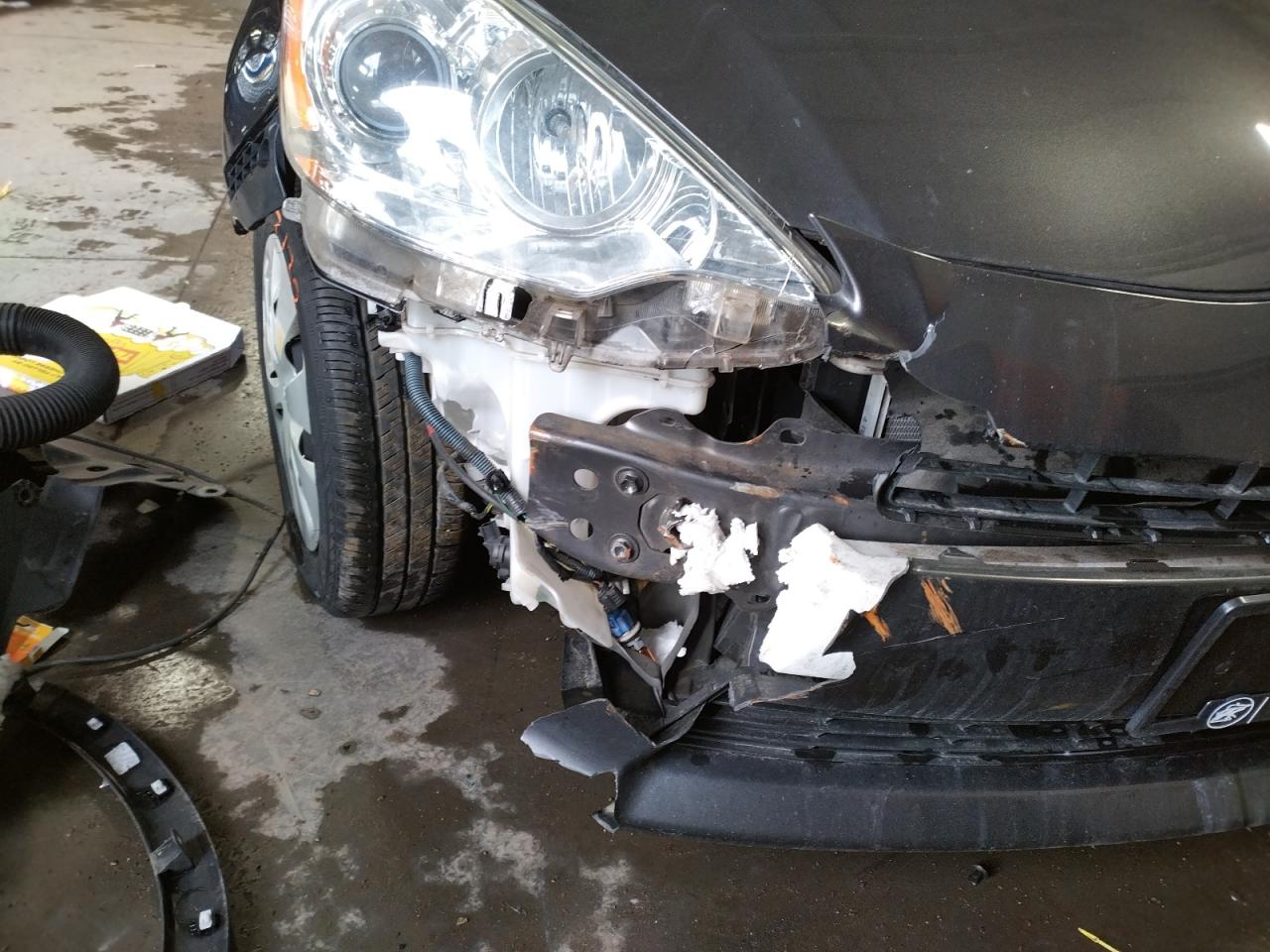 Photo 9 from auction – 2014 TOYOTA PRIUS C with VIN JTDKDTB36E1565232