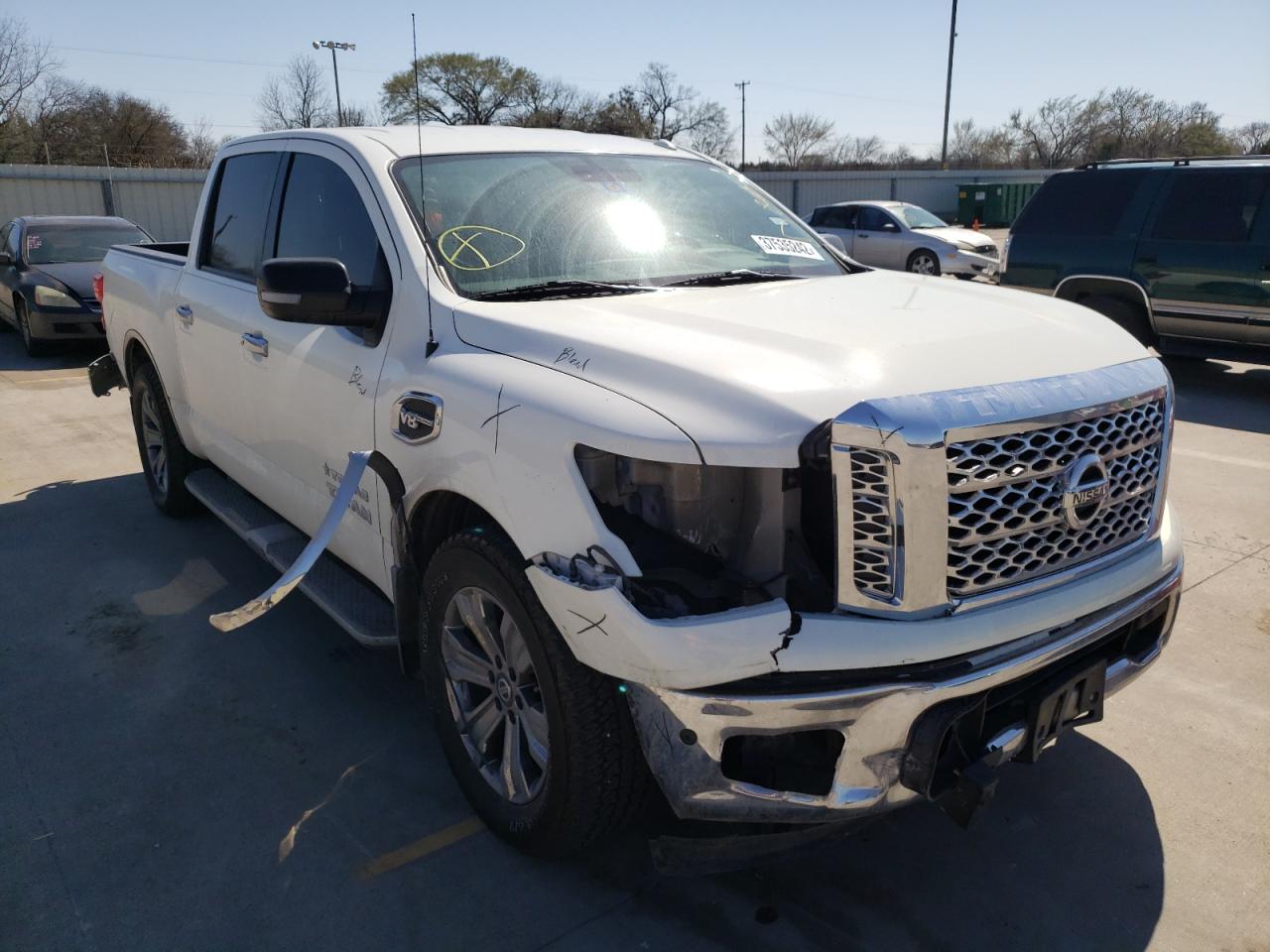 NISSAN TITAN SV 2017 with VIN 1N6AA1E67HN525606 - Photo from auction