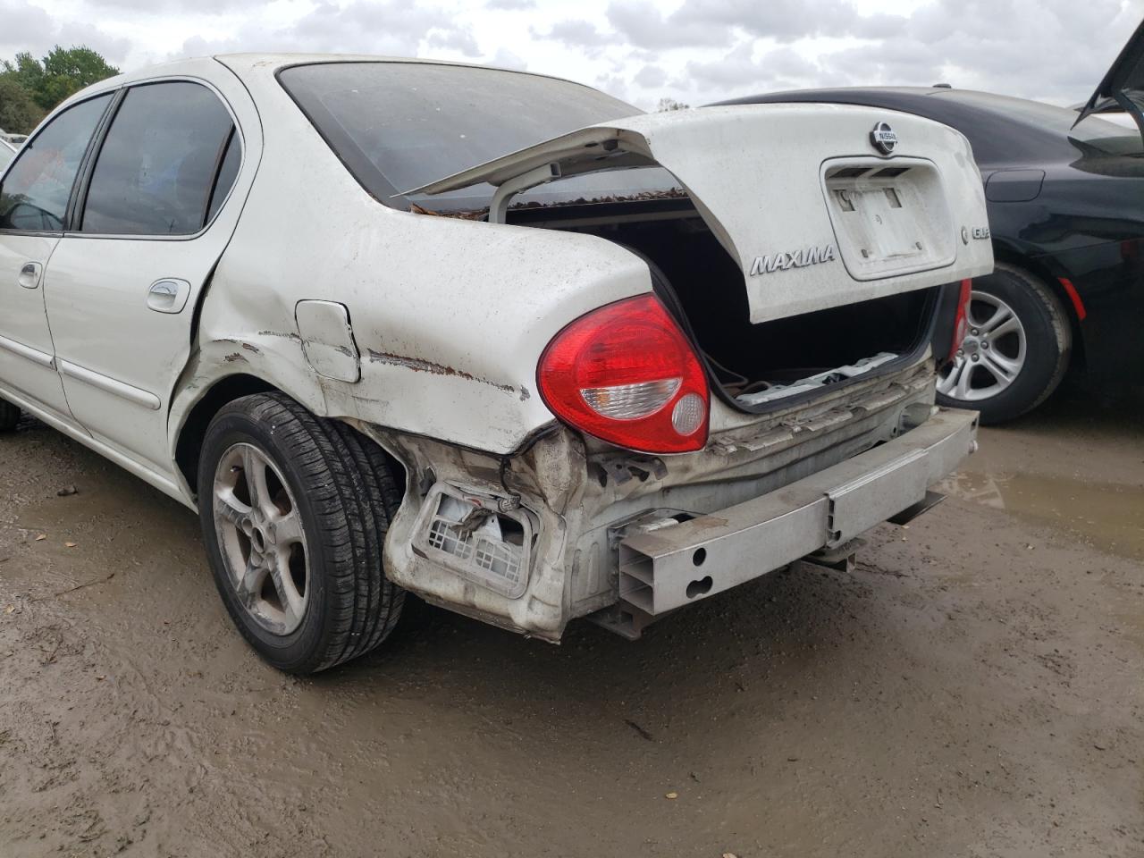 Photo 9 from auction – 2000 NISSAN MAXIMA GLE with VIN JN1CA31D0YT747155