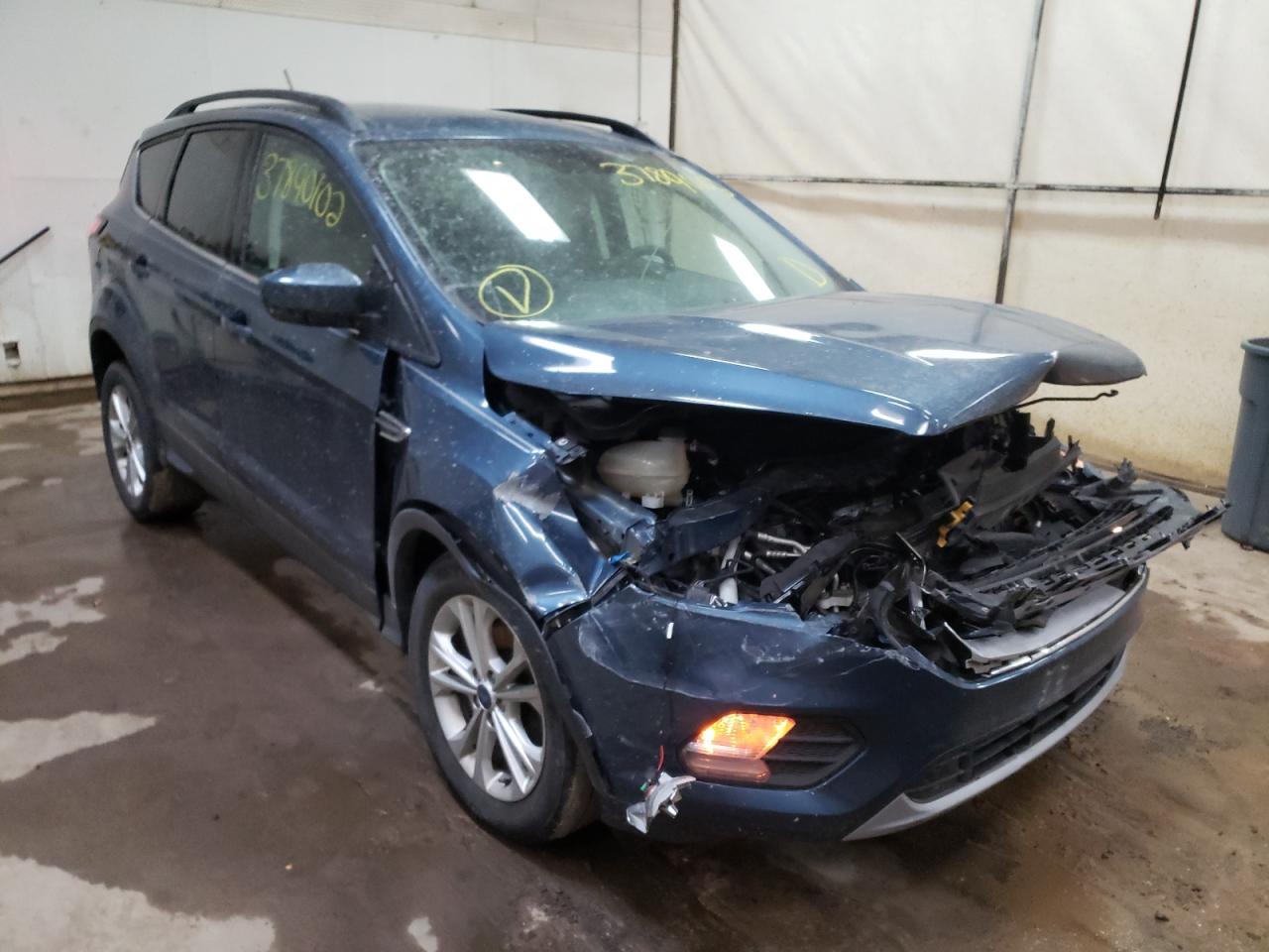 FORD ESCAPE SE 2018 with VIN 1FMCU0GD8JUA03731 - Photo from auction