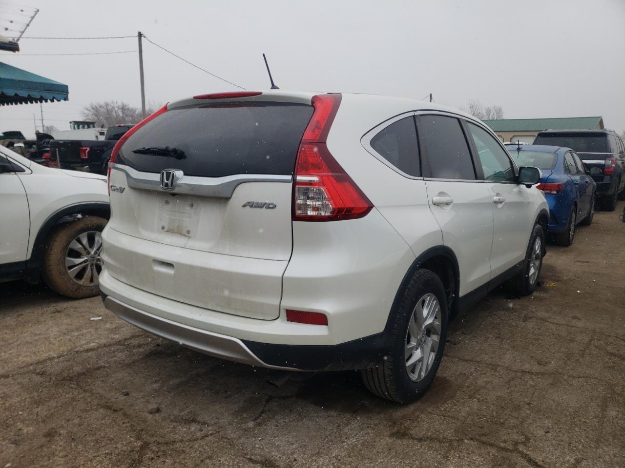 Photo 4 from auction – 2015 HONDA CR-V EX with VIN 5J6RM4H54FL129721