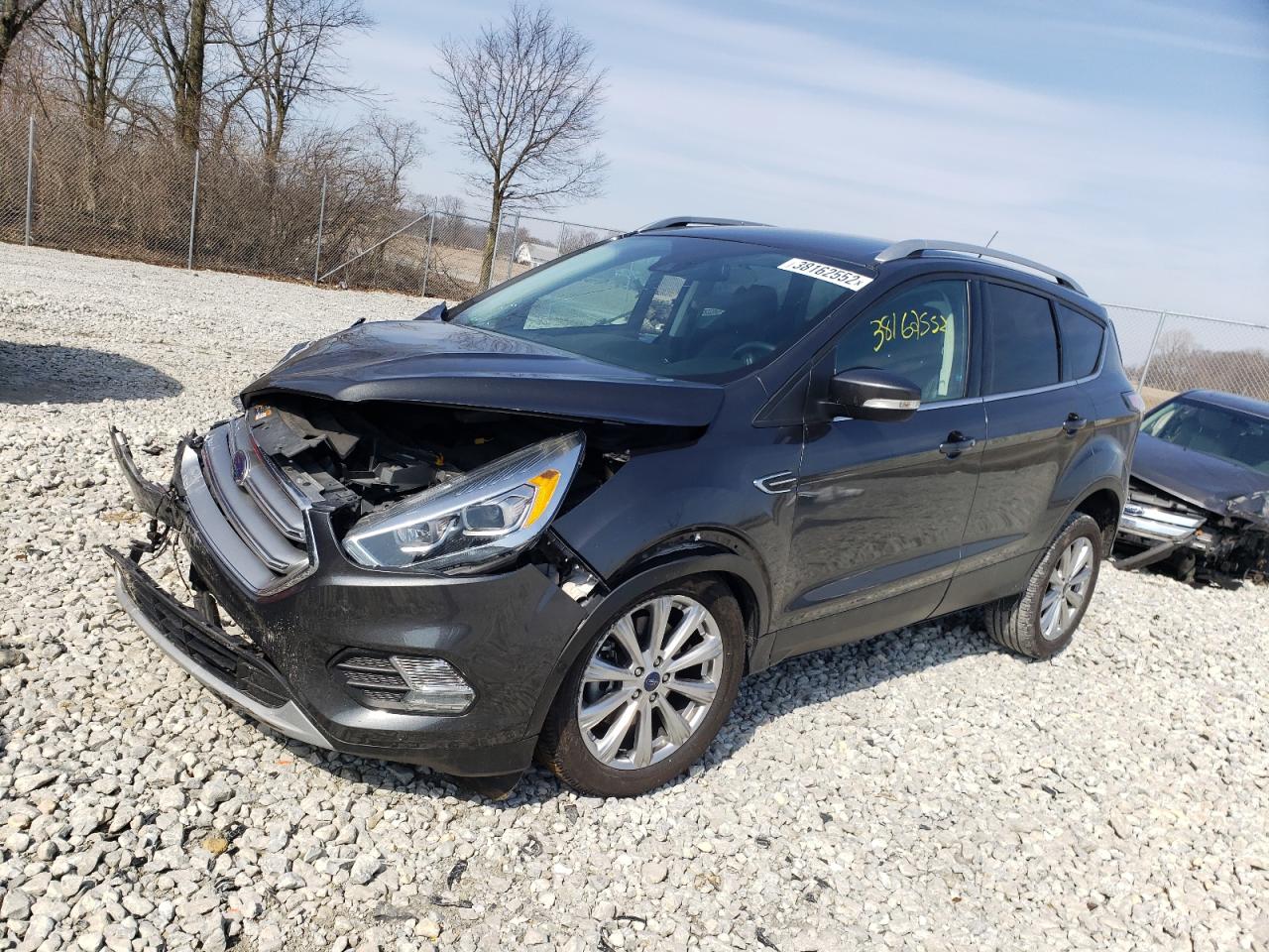 Photo 2 from auction – 2017 FORD ESCAPE TIT with VIN 1FMCU9J92HUB01284
