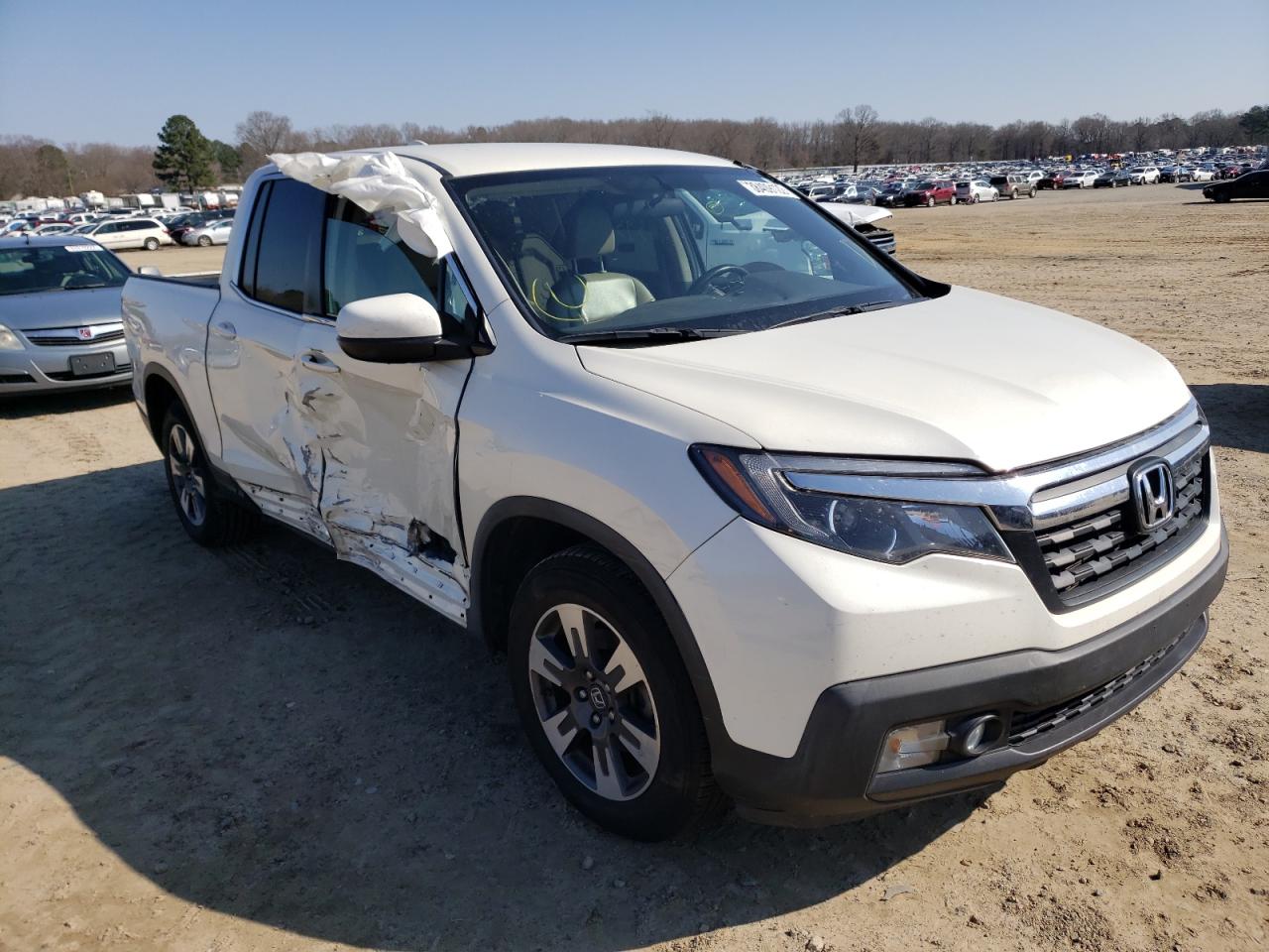 HONDA RIDGELINE 2017 with VIN 5FPYK2F56HB005560 - Photo from auction