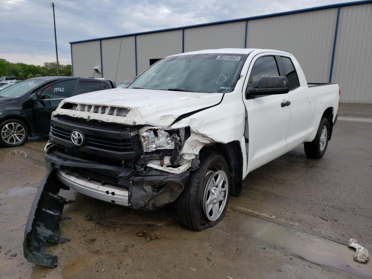 Photo 2 from auction – 2014 TOYOTA TUNDRA DOU with VIN 5TFRM5F15EX070262
