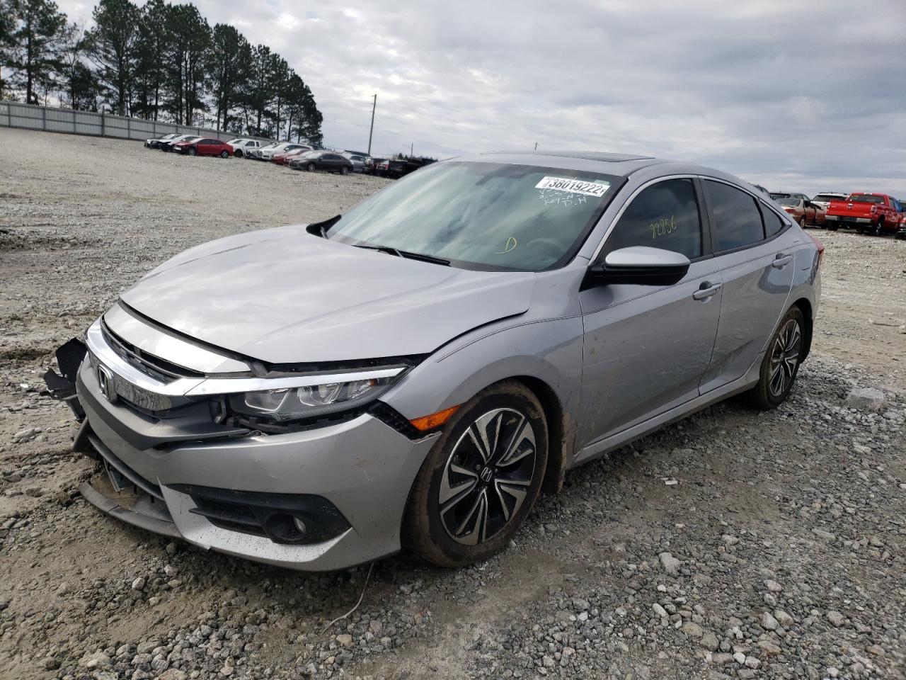Photo 2 from auction – 2016 HONDA CIVIC EX with VIN 2HGFC1F35GH633920
