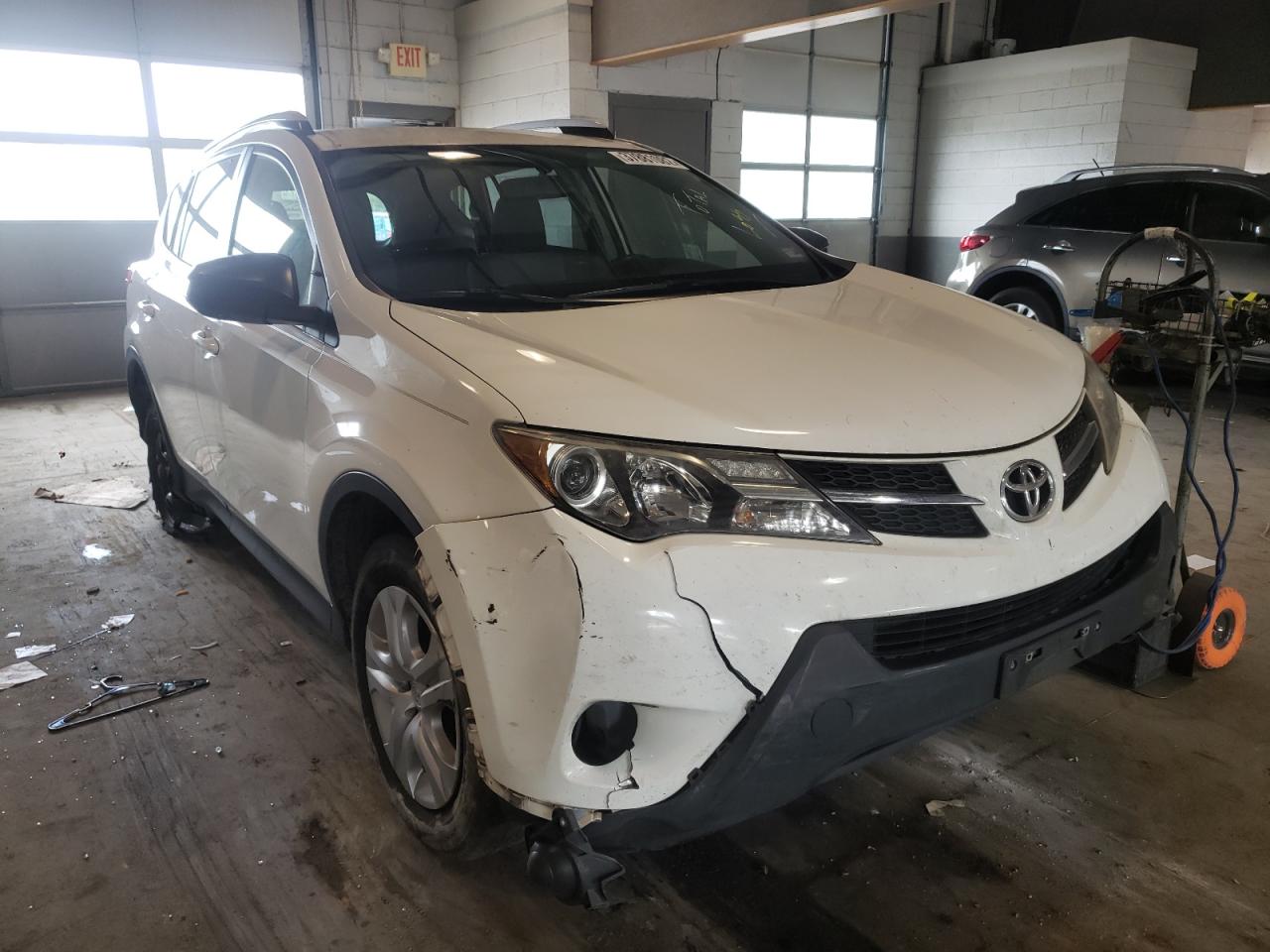 TOYOTA RAV4 LE 2014 with VIN JTMZFREV6EJ021242 - Photo from auction