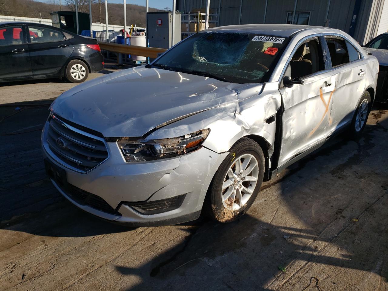 Photo 2 from auction – 2015 FORD TAURUS SE with VIN 1FAHP2D81FG127999