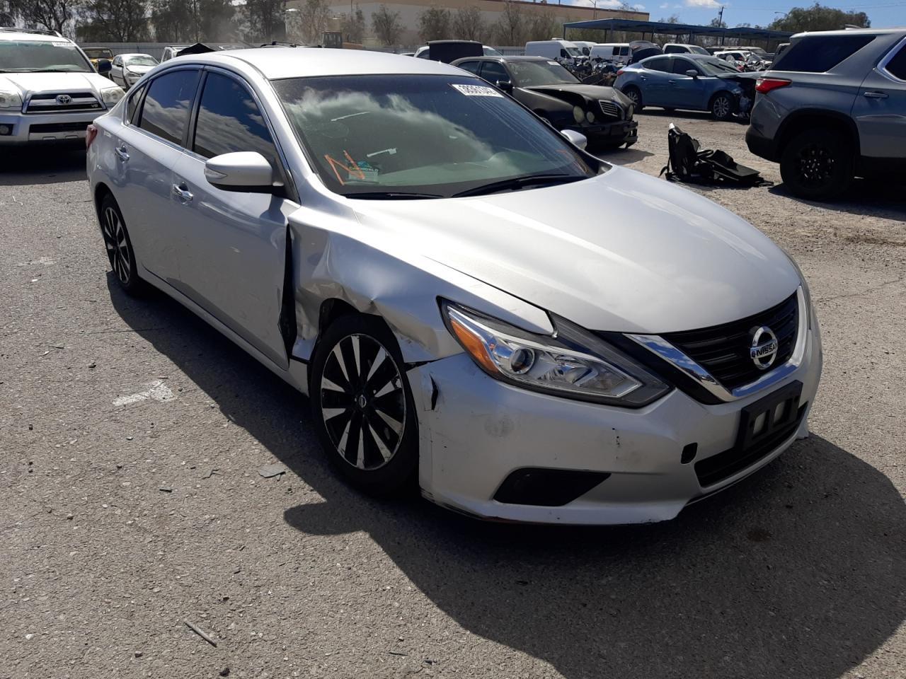 NISSAN ALTIMA 2.5 2018 with VIN 1N4AL3AP2JC214289 - Photo from auction