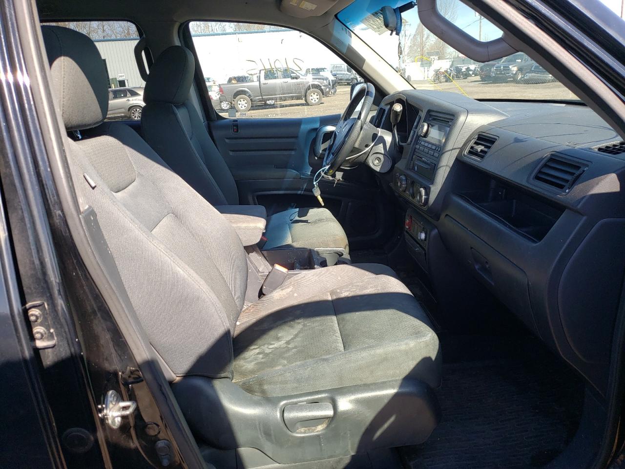 Photo 5 from auction – 2012 HONDA RIDGELINE with VIN 5FPYK1F76CB451065
