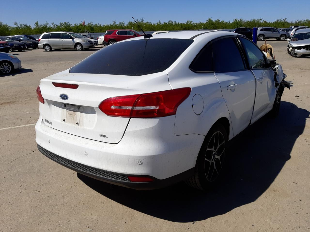 Photo 4 from auction – 2018 FORD FOCUS SEL with VIN 1FADP3H27JL313623