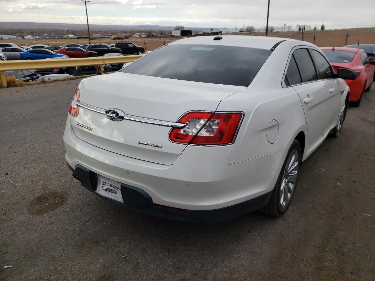 Photo 4 from auction – 2011 FORD TAURUS LIM with VIN 1FAHP2FW2BG106603