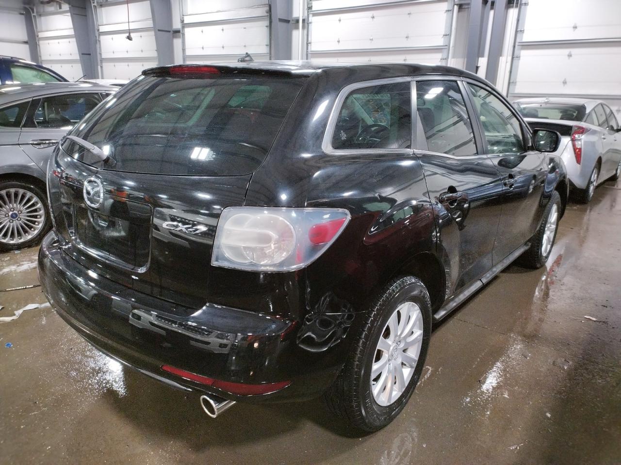 Photo 4 from auction – 2011 MAZDA CX-7 with VIN JM3ER2A50B0398323